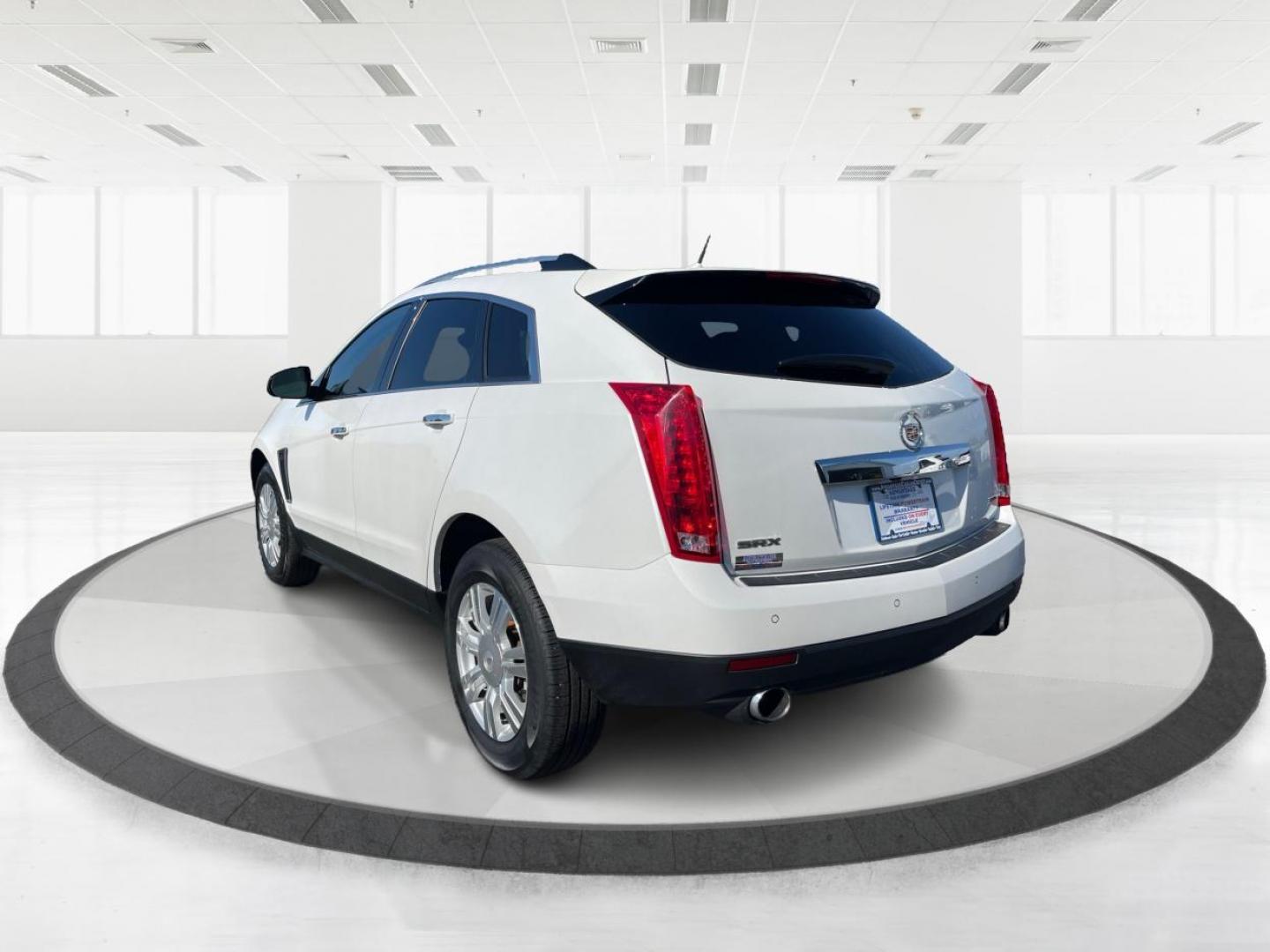 2013 White Cadillac SRX Luxury Collection (3GYFNCE32DS) with an 3.6L V6 DOHC 24V FFV engine, 6-Speed Automatic transmission, located at 880 E. National Road, Vandalia, OH, 45377, (937) 908-9800, 39.891918, -84.183594 - Photo#4