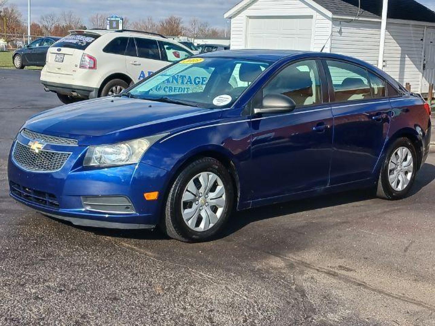 2013 Blue Chevrolet Cruze LS Auto (1G1PA5SH8D7) with an 1.8L L4 DOHC 16V FFV engine, 6-Speed Automatic transmission, located at 401 Woodman Dr, Riverside, OH, 45431, (937) 908-9800, 39.760899, -84.123421 - Photo#2