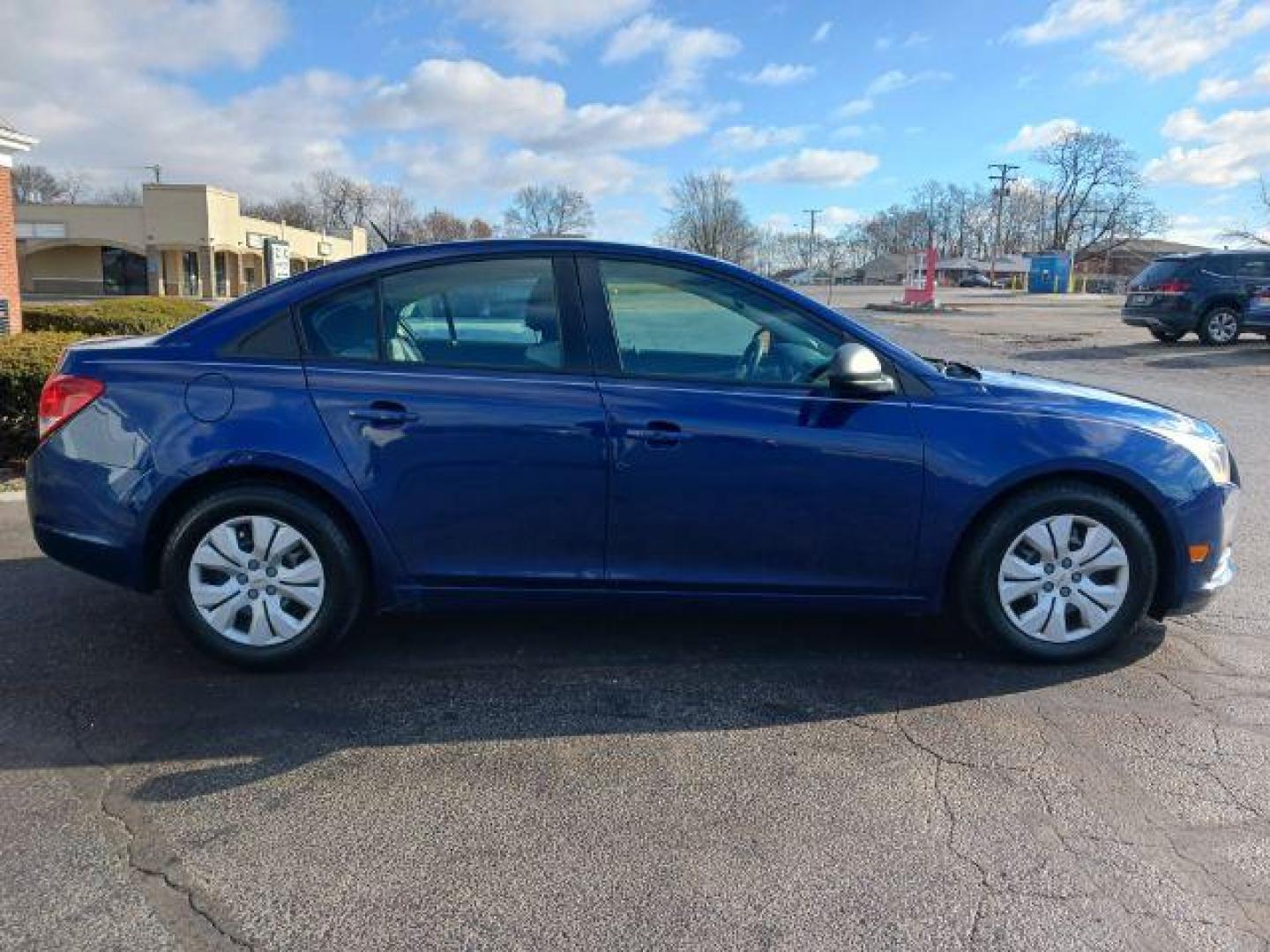 2013 Blue Chevrolet Cruze LS Auto (1G1PA5SH8D7) with an 1.8L L4 DOHC 16V FFV engine, 6-Speed Automatic transmission, located at 401 Woodman Dr, Riverside, OH, 45431, (937) 908-9800, 39.760899, -84.123421 - Photo#4