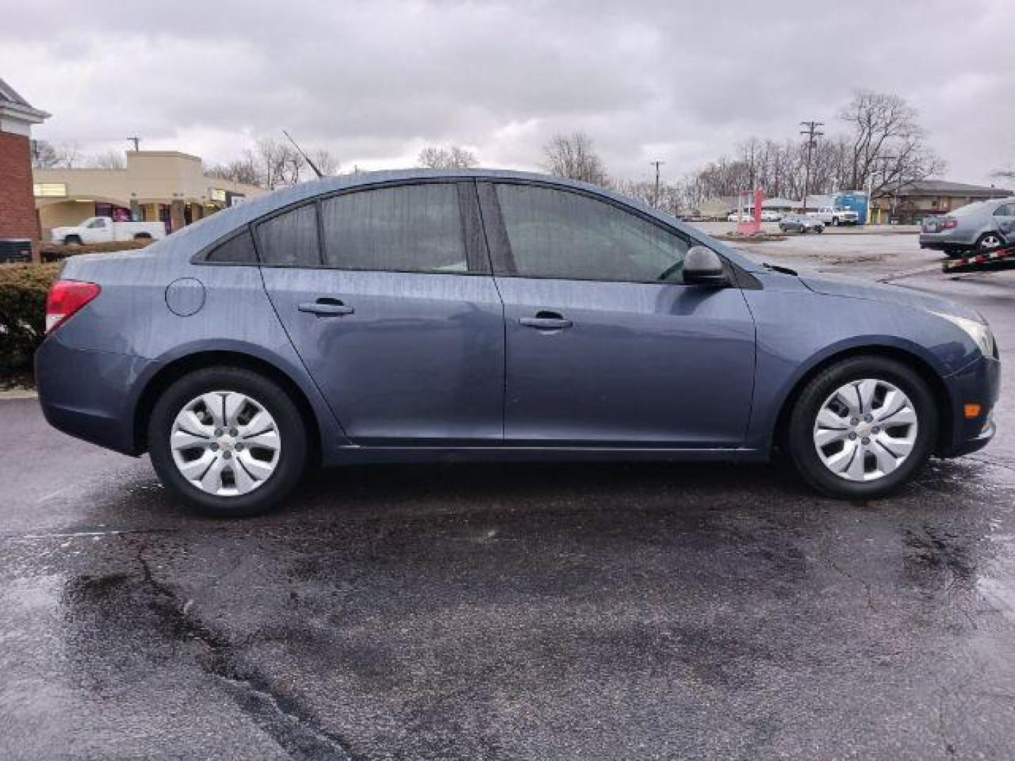 2013 Atlantis Blue Metallic Chevrolet Cruze LS Auto (1G1PA5SG9D7) with an 1.8L L4 DOHC 16V engine, 6-Speed Automatic transmission, located at 4508 South Dixie Dr, Moraine, OH, 45439, (937) 908-9800, 39.689976, -84.218452 - Photo#4