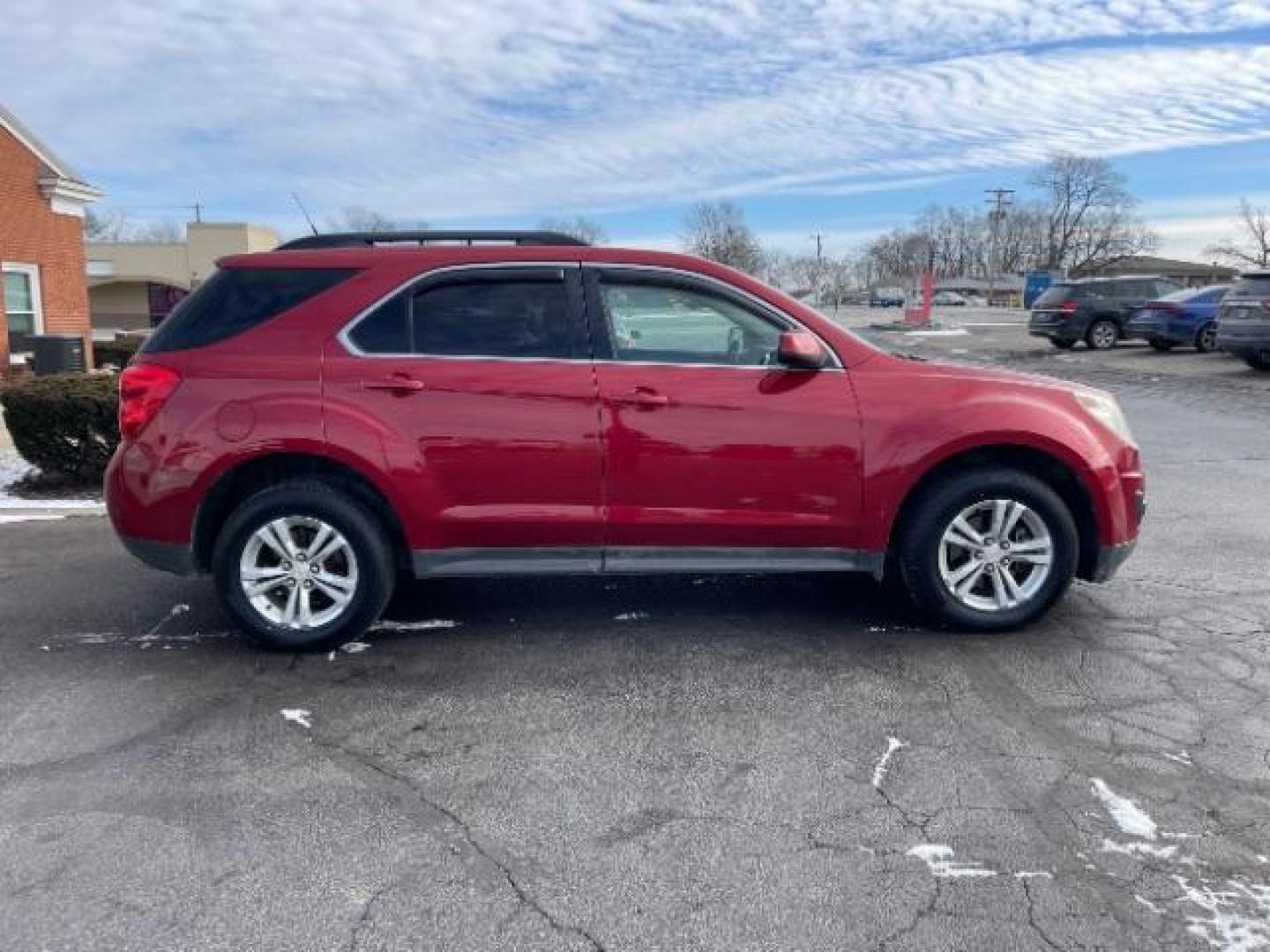 2013 Crystal Red Tintcoat Chevrolet Equinox 1LT AWD (2GNFLEEK4D6) with an 2.4L L4 DOHC 16V engine, 6-Speed Automatic transmission, located at 1184 Kauffman Ave, Fairborn, OH, 45324, (937) 908-9800, 39.807072, -84.030914 - Photo#2