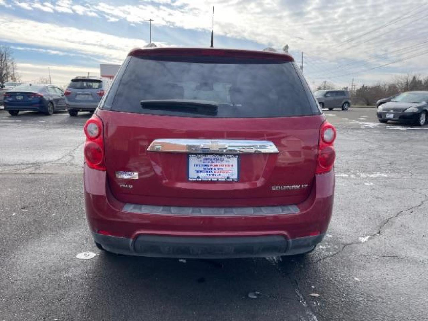 2013 Crystal Red Tintcoat Chevrolet Equinox 1LT AWD (2GNFLEEK4D6) with an 2.4L L4 DOHC 16V engine, 6-Speed Automatic transmission, located at 1184 Kauffman Ave, Fairborn, OH, 45324, (937) 908-9800, 39.807072, -84.030914 - Photo#3