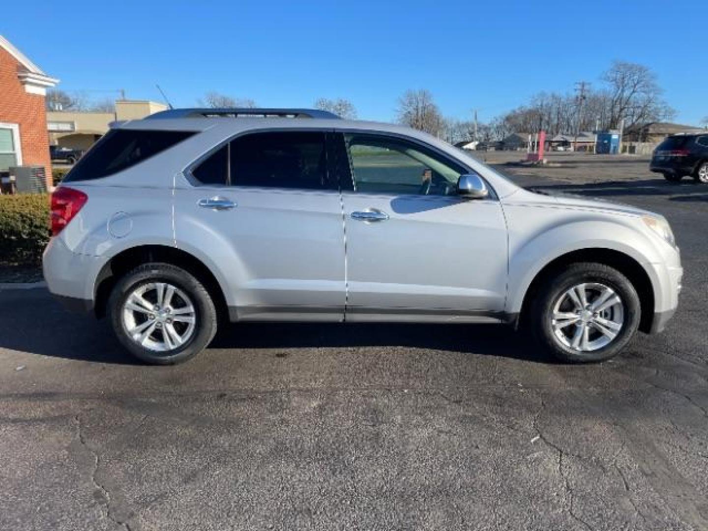 2013 Silver Ice Metallic Chevrolet Equinox LTZ 2WD (2GNALFEK0D6) with an 2.4L L4 DOHC 16V engine, 6-Speed Automatic transmission, located at 880 E. National Road, Vandalia, OH, 45377, (937) 908-9800, 39.891918, -84.183594 - Photo#2