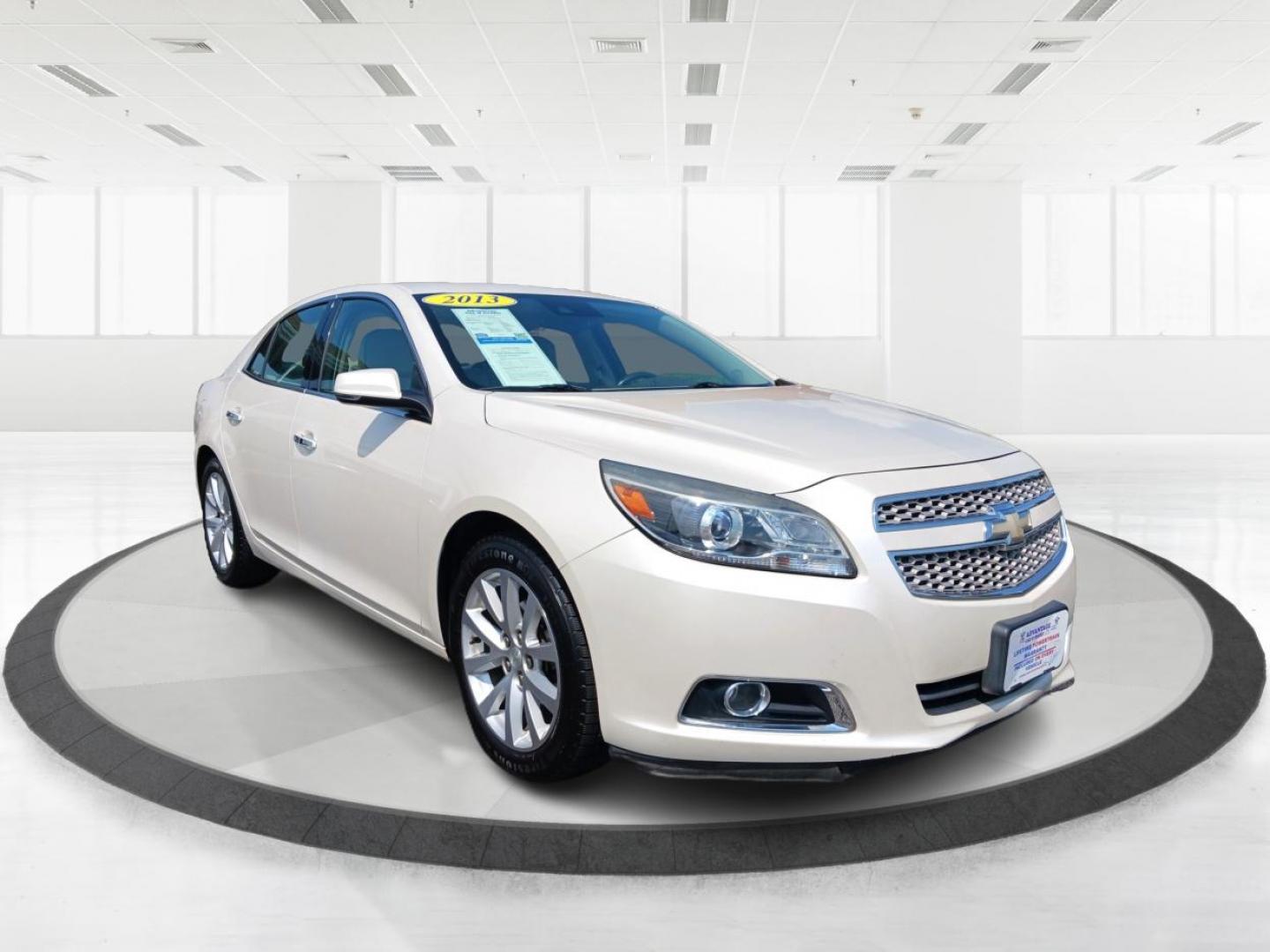 2013 White Diamond Tricoat Chevrolet Malibu (1G11H5SA0DF) with an 2.5L L4 DOHC 16V engine, 6-Speed Automatic transmission, located at 1184 Kauffman Ave, Fairborn, OH, 45324, (937) 908-9800, 39.807072, -84.030914 - Photo#0