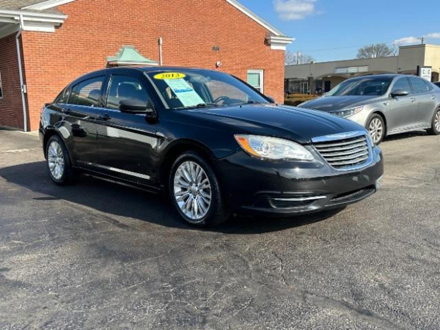 2013 Black Chrysler 200 LX (1C3CCBABXDN) with an 2.4L L4 DOHC 16V engine, 6-Speed Automatic transmission, located at 1184 Kauffman Ave, Fairborn, OH, 45324, (937) 908-9800, 39.807072, -84.030914 - Photo#0