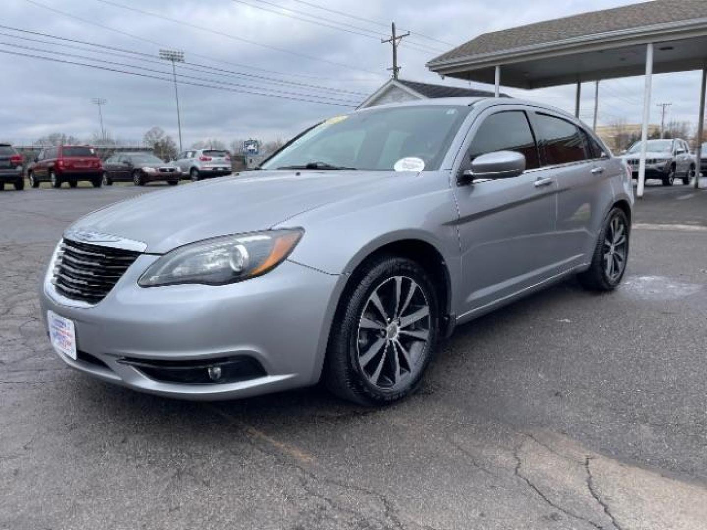 2013 Billet Silver Metallic Chrysler 200 Touring (1C3CCBBG8DN) with an 3.6L V6 DOHC 24V FFV engine, 6-Speed Automatic transmission, located at 4508 South Dixie Dr, Moraine, OH, 45439, (937) 908-9800, 39.689976, -84.218452 - Photo#1