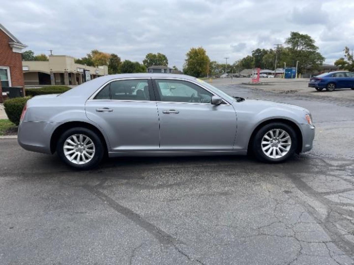 2013 Billet Silver Metallic Chrysler 300 RWD (2C3CCAAG3DH) with an 3.6L V6 SOHC 24V engine, 8-Speed Automatic transmission, located at 1951 S Dayton Lakeview Rd., New Carlisle, OH, 45344, (937) 908-9800, 39.890999, -84.050255 - Photo#3