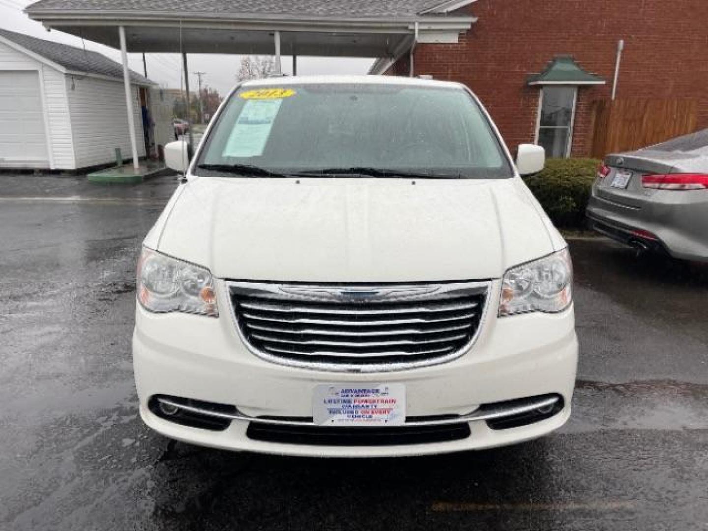 2013 Stone White Chrysler Town and Country Touring (2C4RC1BG7DR) with an 3.6L V6 DOHC 24V engine, 6-Speed Automatic transmission, located at 401 Woodman Dr, Riverside, OH, 45431, (937) 908-9800, 39.760899, -84.123421 - Photo#2