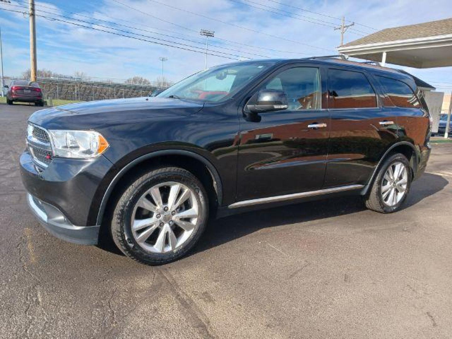 2013 Brilliant Black Crystal Pearl Dodge Durango Crew AWD (1C4RDJDG9DC) with an 3.6L V6 DOHC 24V engine, 5-Speed Automatic transmission, located at 1230 East Main St, Xenia, OH, 45385, (937) 908-9800, 39.688026, -83.910172 - Photo#2