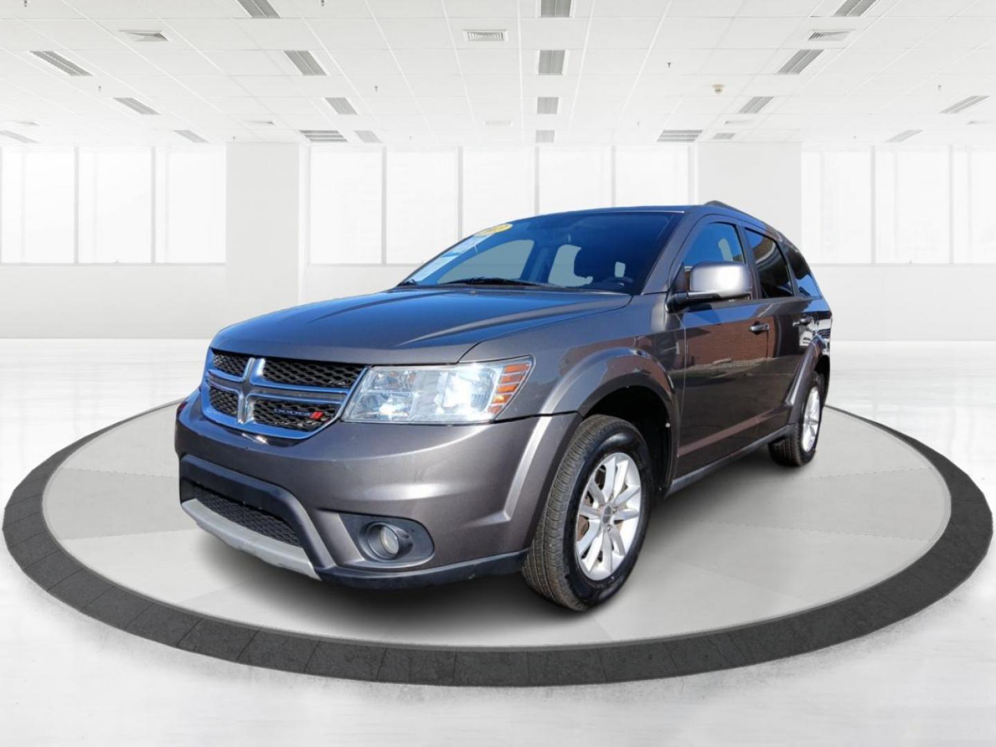 2013 Storm Grey Pearl Dodge Journey SXT (3C4PDCBG0DT) with an 3.6L V6 DOHC 24V engine, 6-Speed Automatic transmission, located at 880 E. National Road, Vandalia, OH, 45377, (937) 908-9800, 39.891918, -84.183594 - Photo#7