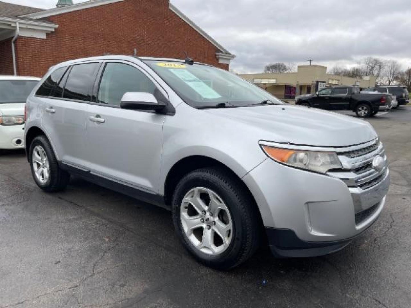 2013 Ingot Silver Metallic Ford Edge SEL AWD (2FMDK4JC9DB) with an 3.5L V6 DOHC 24V engine, 6-Speed Automatic transmission, located at 1951 S Dayton Lakeview Rd., New Carlisle, OH, 45344, (937) 908-9800, 39.890999, -84.050255 - Photo#0