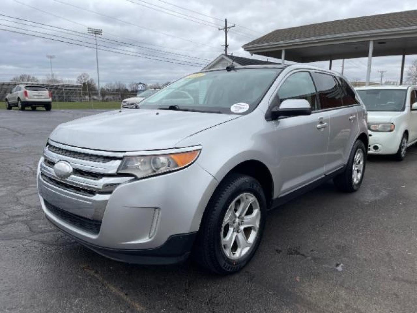 2013 Ingot Silver Metallic Ford Edge SEL AWD (2FMDK4JC9DB) with an 3.5L V6 DOHC 24V engine, 6-Speed Automatic transmission, located at 1951 S Dayton Lakeview Rd., New Carlisle, OH, 45344, (937) 908-9800, 39.890999, -84.050255 - Photo#1