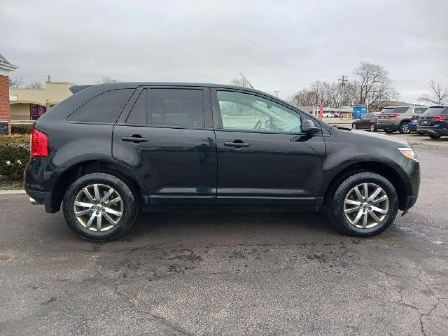 2013 Tuxedo Black Metallic Ford Edge SEL AWD (2FMDK4JC4DB) with an 3.5L V6 DOHC 24V engine, 6-Speed Automatic transmission, located at 4508 South Dixie Dr, Moraine, OH, 45439, (937) 908-9800, 39.689976, -84.218452 - Photo#4