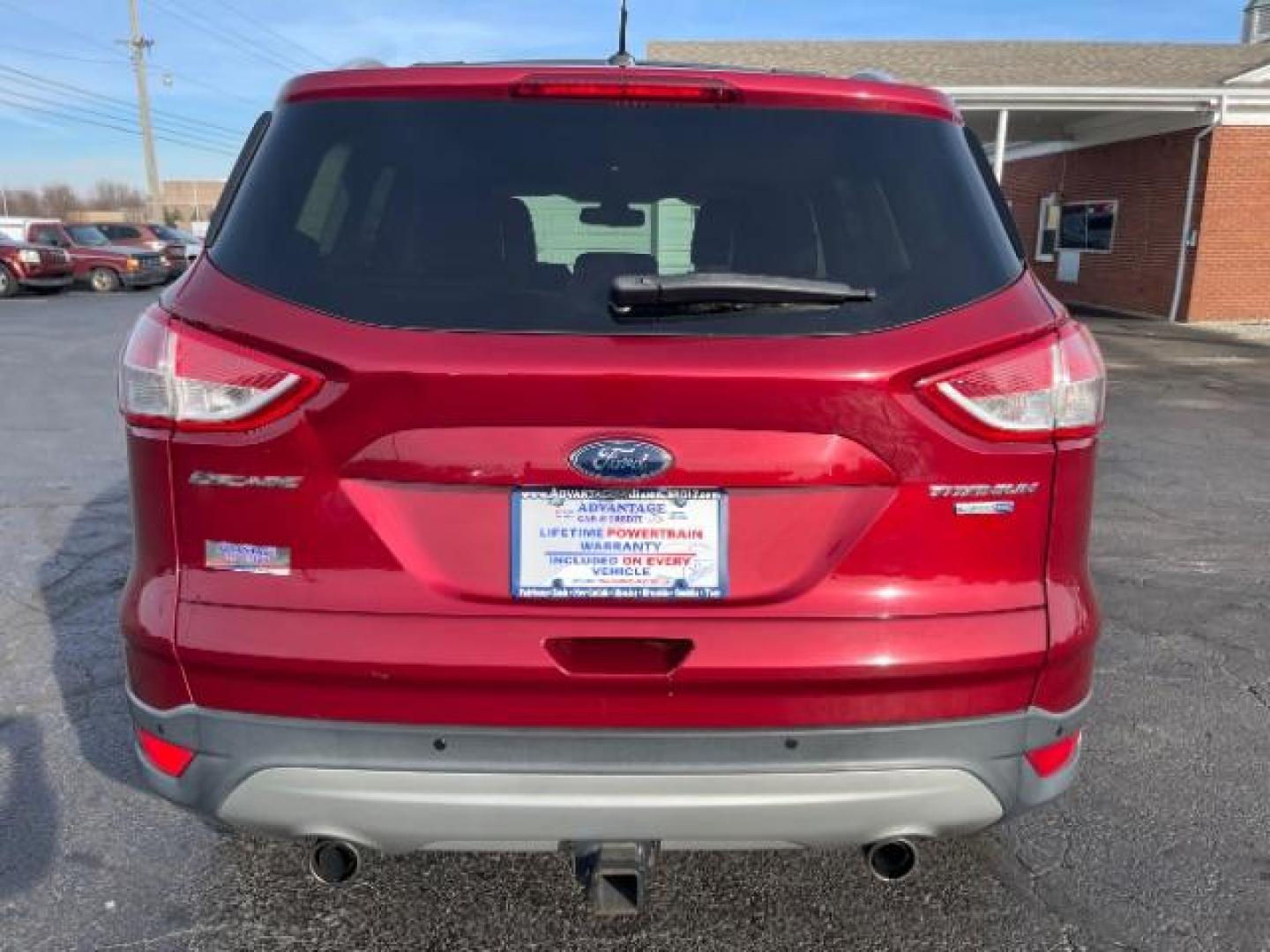 2013 Ruby Red Metallic Tinted Ford Escape Titanium 4WD (1FMCU9J92DU) with an 2.0L L4 DOHC 16V engine, 6-Speed Automatic transmission, located at 880 E. National Road, Vandalia, OH, 45377, (937) 908-9800, 39.891918, -84.183594 - Photo#3