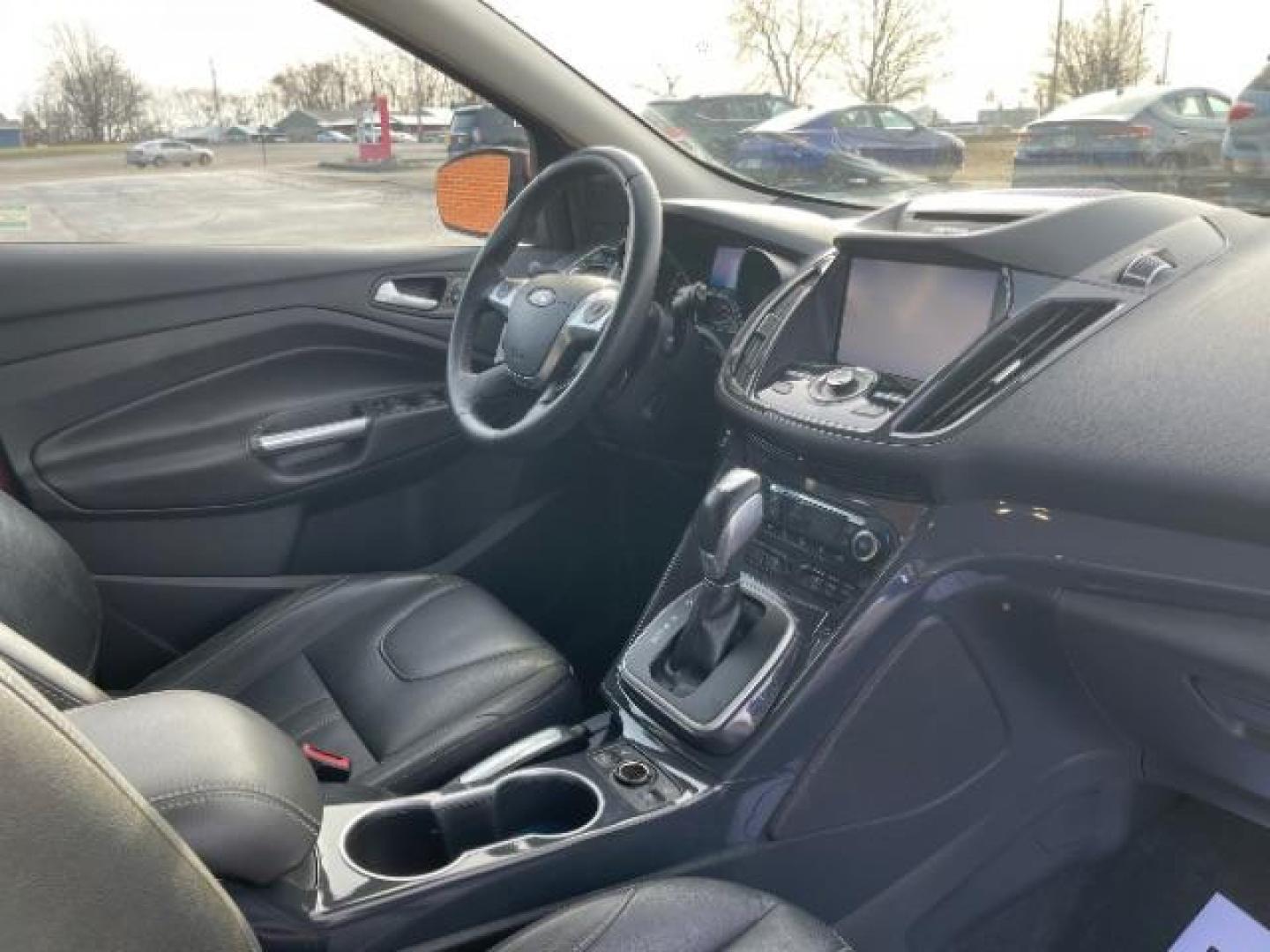 2013 Ruby Red Metallic Tinted Ford Escape Titanium 4WD (1FMCU9J92DU) with an 2.0L L4 DOHC 16V engine, 6-Speed Automatic transmission, located at 880 E. National Road, Vandalia, OH, 45377, (937) 908-9800, 39.891918, -84.183594 - Photo#7