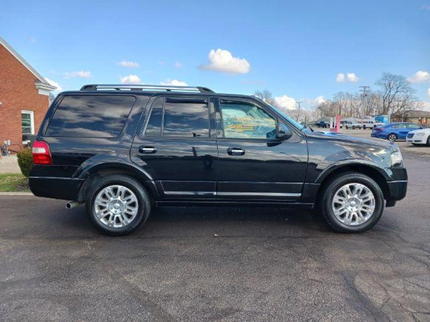 2013 Tuxedo Black Metallic Ford Expedition Limited 2WD (1FMJU1K58DE) with an 5.4L V8 SOHC 16V FFV engine, 6-Speed Automatic transmission, located at 4508 South Dixie Dr, Moraine, OH, 45439, (937) 908-9800, 39.689976, -84.218452 - Photo#4