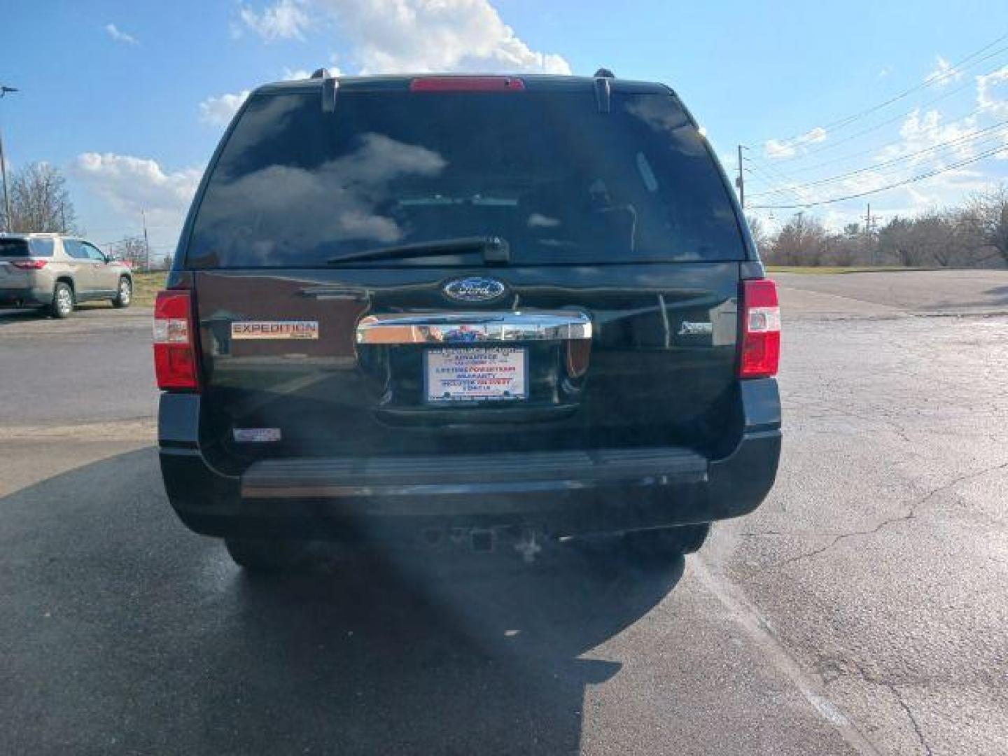 2013 Tuxedo Black Metallic Ford Expedition Limited 2WD (1FMJU1K58DE) with an 5.4L V8 SOHC 16V FFV engine, 6-Speed Automatic transmission, located at 4508 South Dixie Dr, Moraine, OH, 45439, (937) 908-9800, 39.689976, -84.218452 - Photo#5