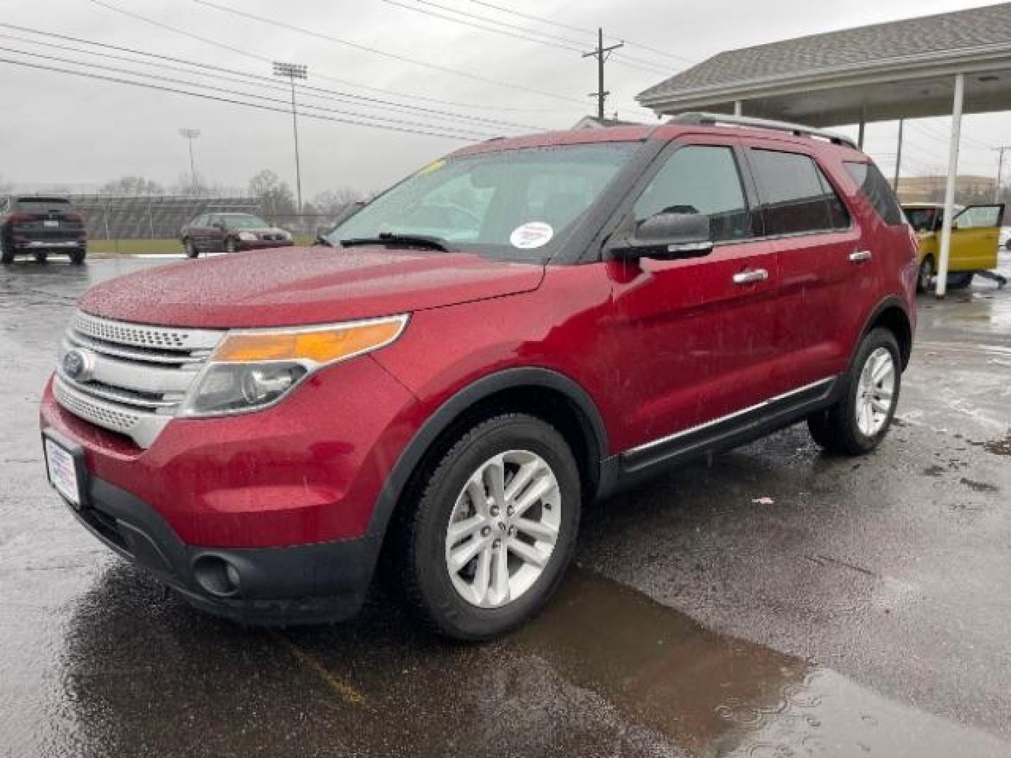 2013 Ruby Red Metallic Ford Explorer XLT 4WD (1FM5K8D83DG) with an 3.5L V6 DOHC 24V engine, 6-Speed Automatic transmission, located at 1099 N County Rd 25A , Troy, OH, 45373, (937) 908-9800, 40.057079, -84.212883 - Photo#1