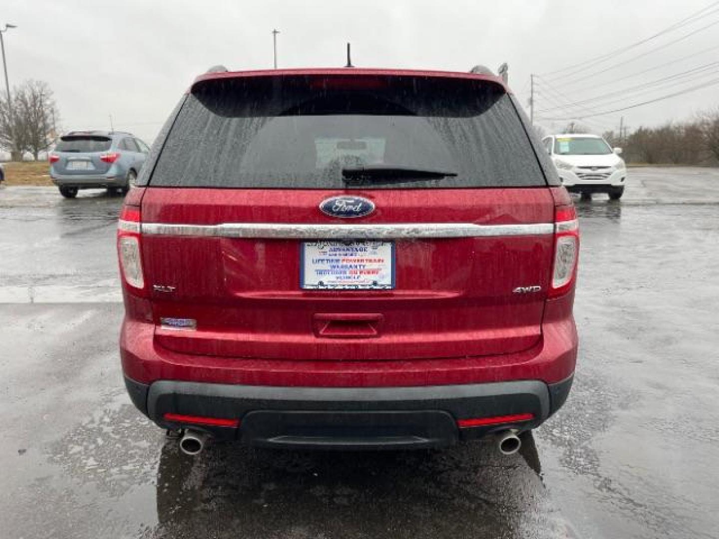 2013 Ruby Red Metallic Ford Explorer XLT 4WD (1FM5K8D83DG) with an 3.5L V6 DOHC 24V engine, 6-Speed Automatic transmission, located at 1099 N County Rd 25A , Troy, OH, 45373, (937) 908-9800, 40.057079, -84.212883 - Photo#4