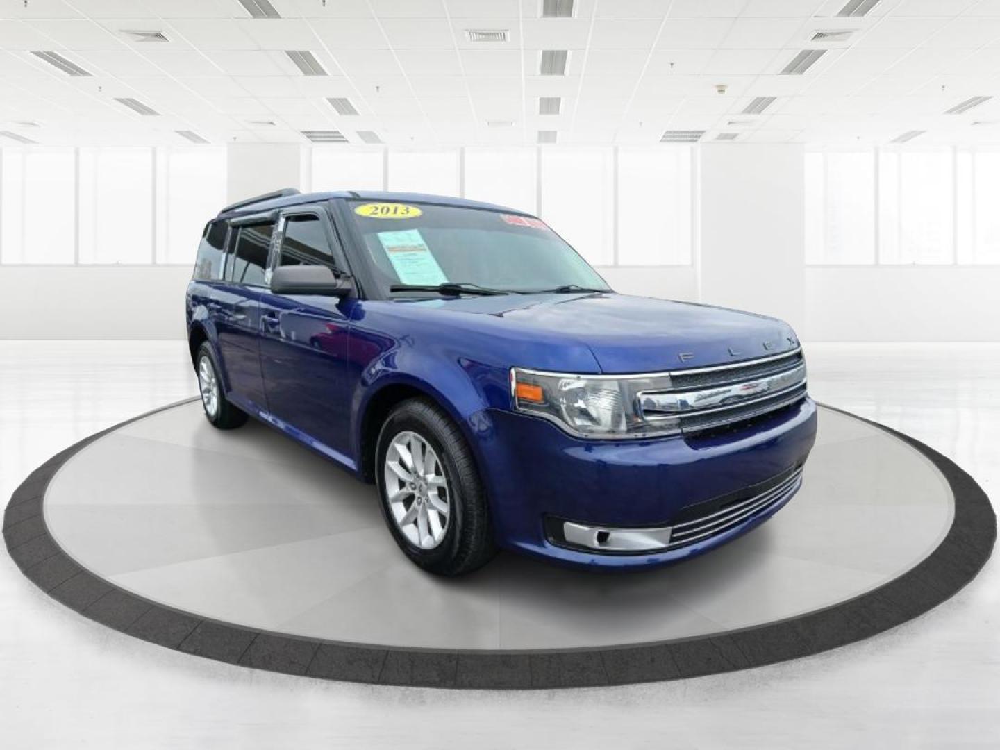 2013 Deep Impact Blue Metallic Ford Flex SE FWD (2FMGK5B8XDB) with an 3.5L V6 DOHC 24V engine, 6-Speed Automatic Overdrive transmission, located at 1951 S Dayton Lakeview Rd., New Carlisle, OH, 45344, (937) 908-9800, 39.890999, -84.050255 - 2013 Ford Flex SE FWD - Photo#0