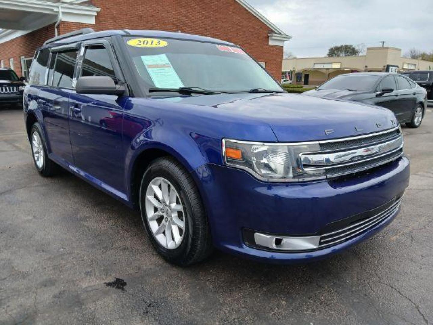 2013 Deep Impact Blue Metallic Ford Flex SE FWD (2FMGK5B8XDB) with an 3.5L V6 DOHC 24V engine, 6-Speed Automatic Overdrive transmission, located at 1951 S Dayton Lakeview Rd., New Carlisle, OH, 45344, (937) 908-9800, 39.890999, -84.050255 - 2013 Ford Flex SE FWD - Photo#13