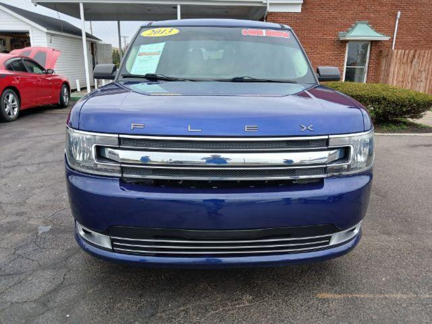 2013 Deep Impact Blue Metallic Ford Flex SE FWD (2FMGK5B8XDB) with an 3.5L V6 DOHC 24V engine, 6-Speed Automatic Overdrive transmission, located at 1951 S Dayton Lakeview Rd., New Carlisle, OH, 45344, (937) 908-9800, 39.890999, -84.050255 - 2013 Ford Flex SE FWD - Photo#17