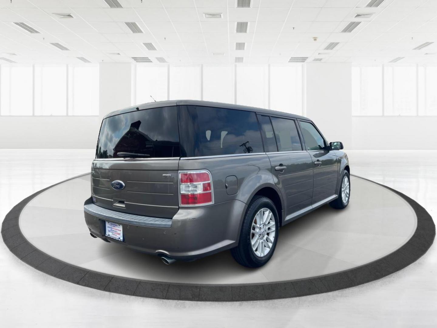 2013 Mineral Gray Metallic Ford Flex SEL FWD (2FMGK5C85DB) with an 3.5L V6 DOHC 24V engine, 6-Speed Automatic Overdrive transmission, located at 4508 South Dixie Dr, Moraine, OH, 45439, (937) 908-9800, 39.689976, -84.218452 - Third Row - Photo#2