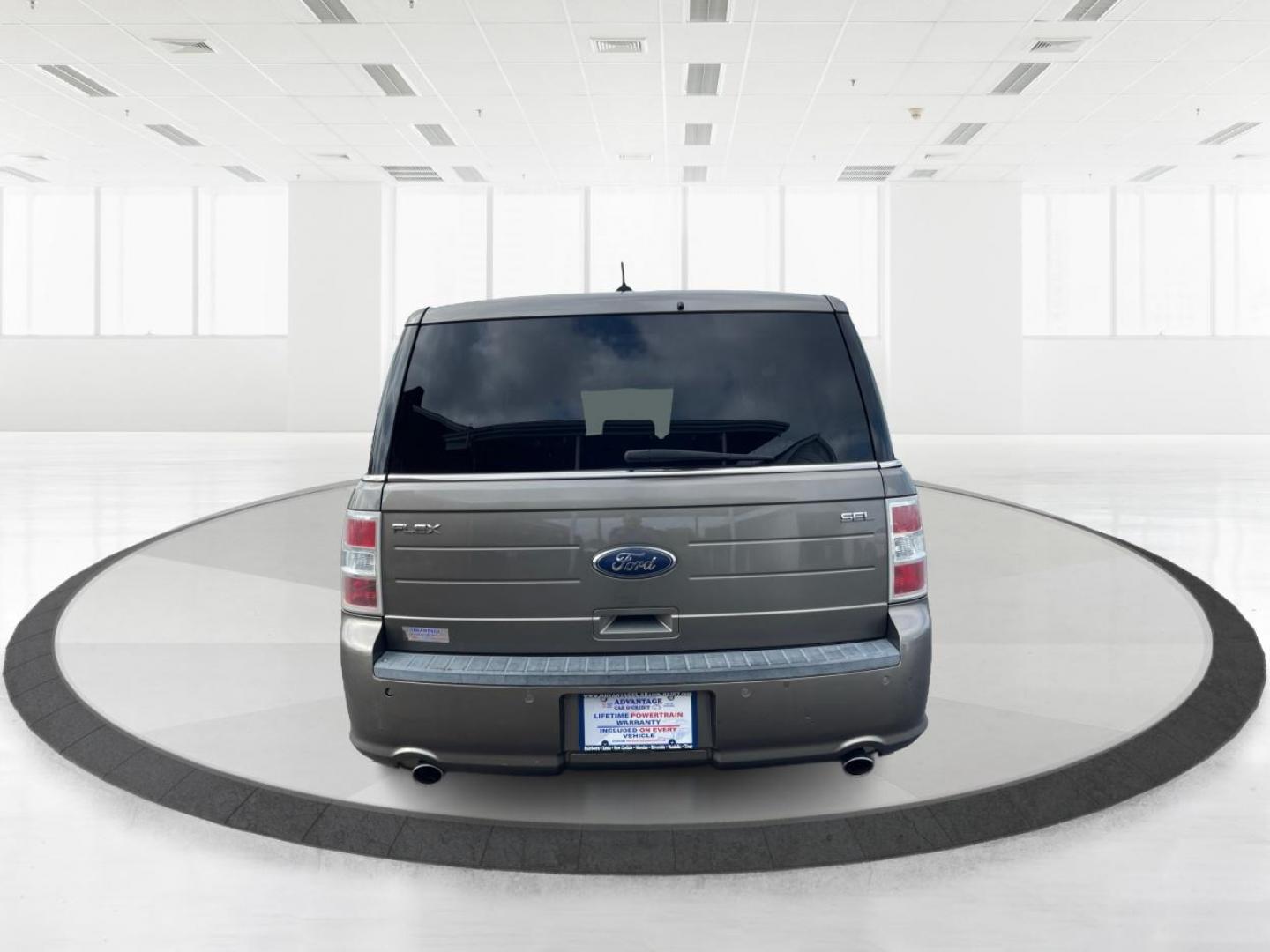 2013 Mineral Gray Metallic Ford Flex SEL FWD (2FMGK5C85DB) with an 3.5L V6 DOHC 24V engine, 6-Speed Automatic Overdrive transmission, located at 4508 South Dixie Dr, Moraine, OH, 45439, (937) 908-9800, 39.689976, -84.218452 - Third Row - Photo#3