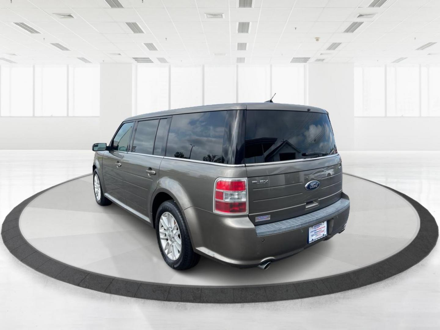 2013 Mineral Gray Metallic Ford Flex SEL FWD (2FMGK5C85DB) with an 3.5L V6 DOHC 24V engine, 6-Speed Automatic Overdrive transmission, located at 4508 South Dixie Dr, Moraine, OH, 45439, (937) 908-9800, 39.689976, -84.218452 - Third Row - Photo#4