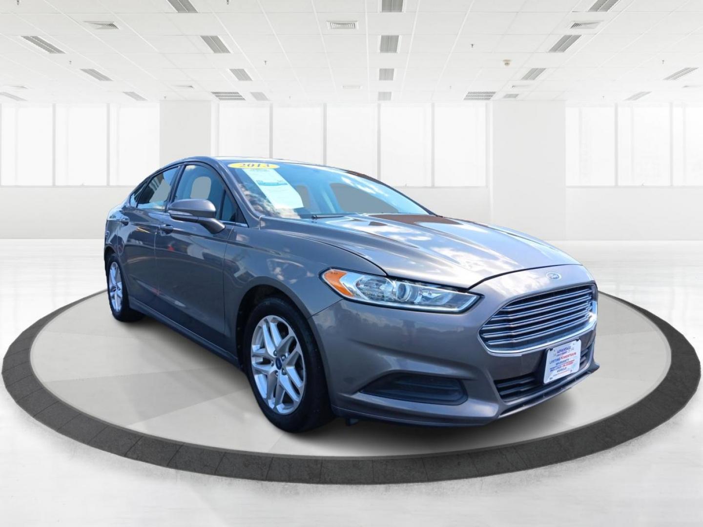 2013 Sterling Gray Ford Fusion (3FA6P0H78DR) with an 2.5L L4 DOHC 16V engine, located at 4508 South Dixie Dr, Moraine, OH, 45439, (937) 908-9800, 39.689976, -84.218452 - Photo#0