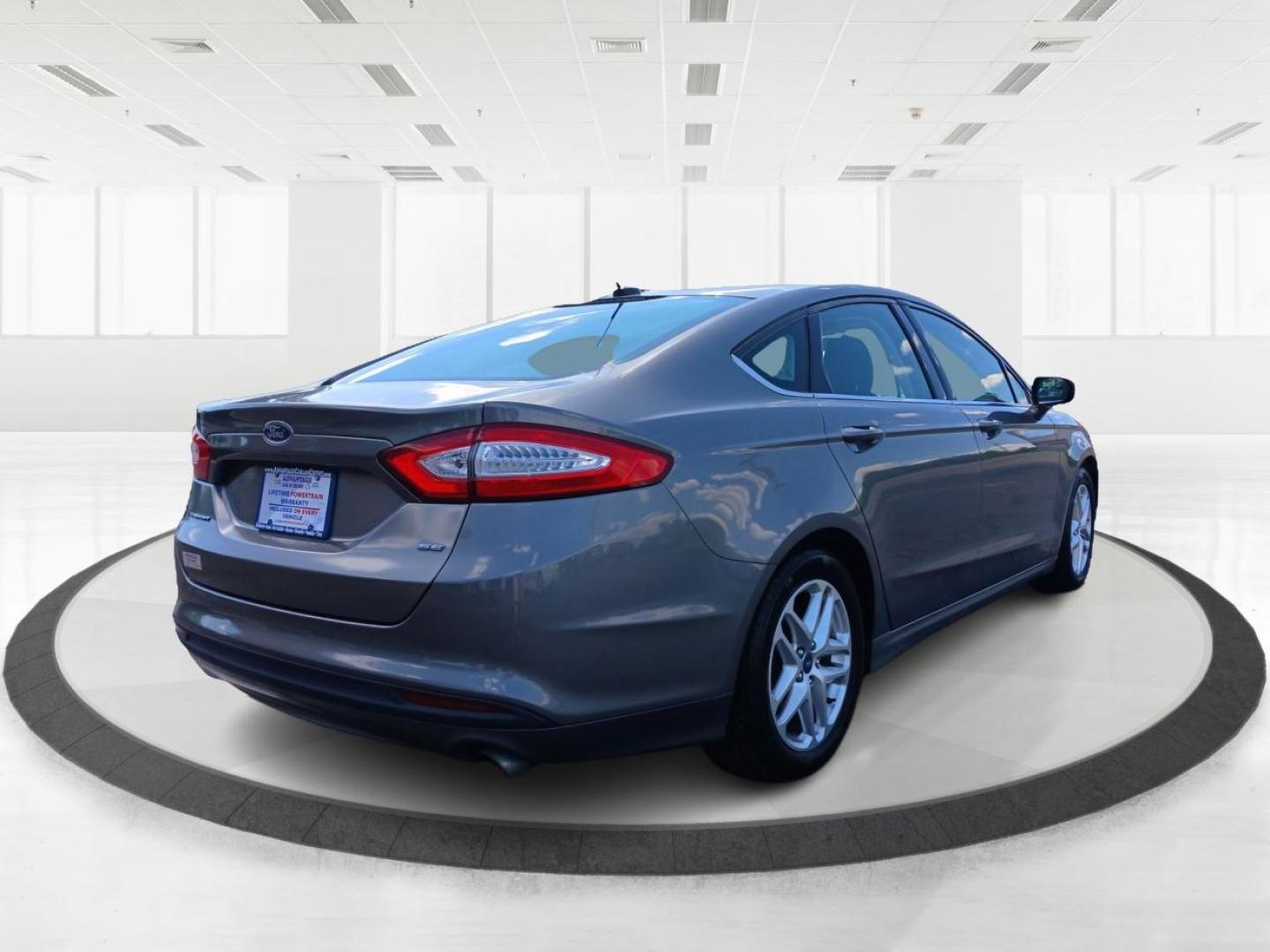 2013 Sterling Gray Ford Fusion (3FA6P0H78DR) with an 2.5L L4 DOHC 16V engine, located at 4508 South Dixie Dr, Moraine, OH, 45439, (937) 908-9800, 39.689976, -84.218452 - Photo#2