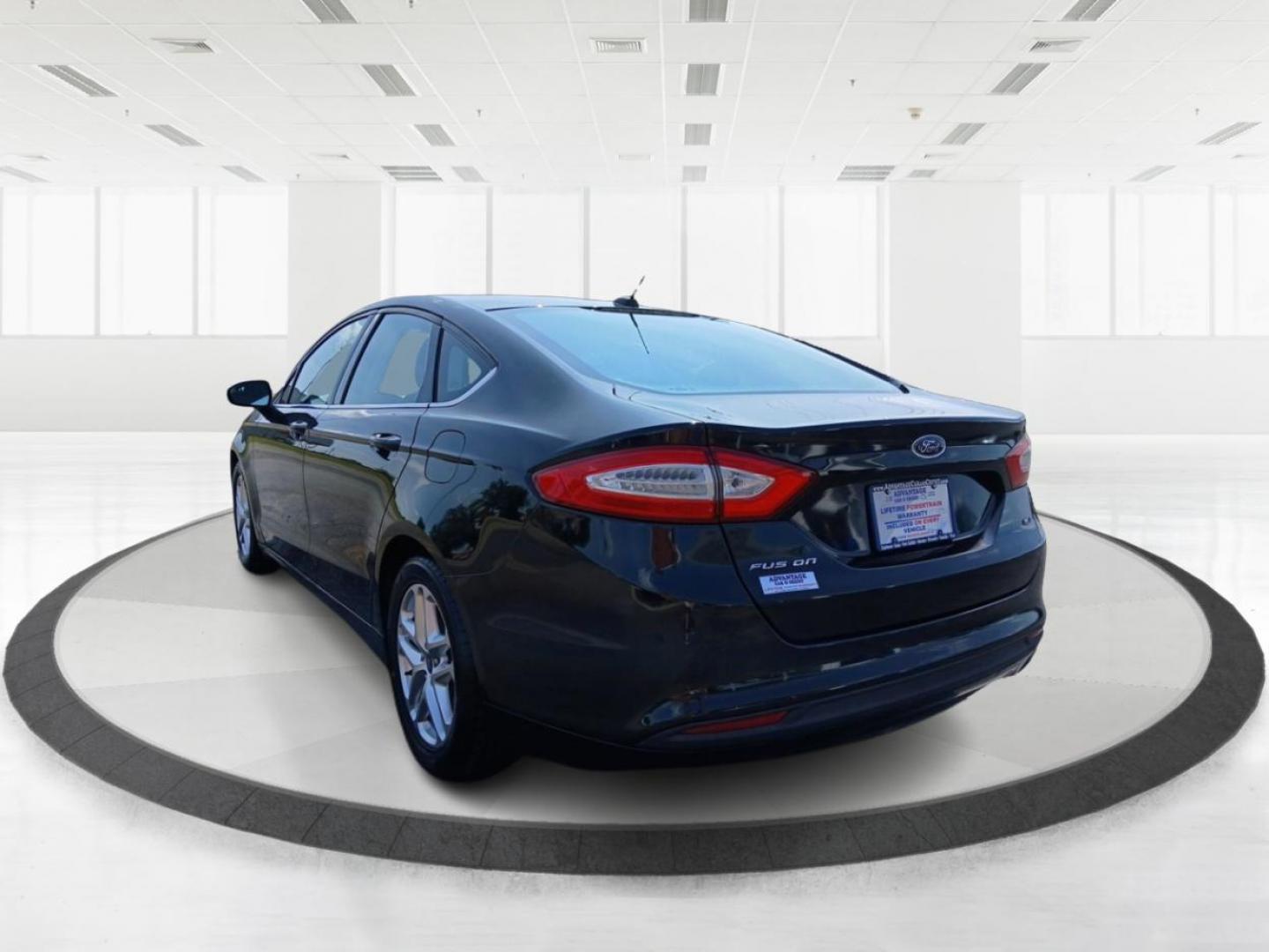 2013 Tuxedo Black Metallic Ford Fusion (3FA6P0H74DR) with an 2.5L L4 DOHC 16V engine, located at 401 Woodman Dr, Riverside, OH, 45431, (937) 908-9800, 39.760899, -84.123421 - Photo#4