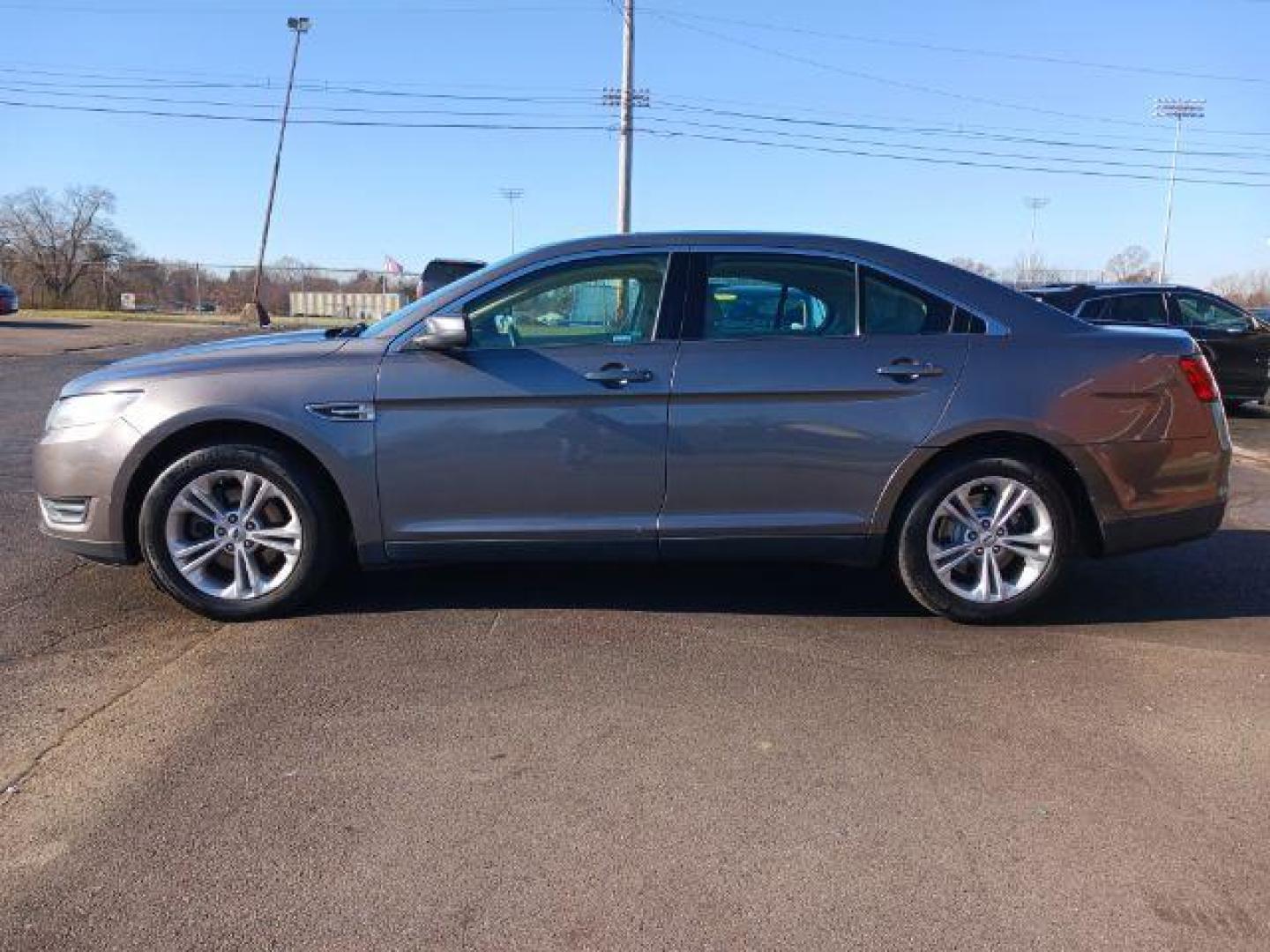 2013 Sterling Gray Metallic Ford Taurus SEL FWD (1FAHP2E81DG) with an 3.5L V6 DOHC 24V engine, 6-Speed Automatic transmission, located at 1951 S Dayton Lakeview Rd., New Carlisle, OH, 45344, (937) 908-9800, 39.890999, -84.050255 - Photo#3