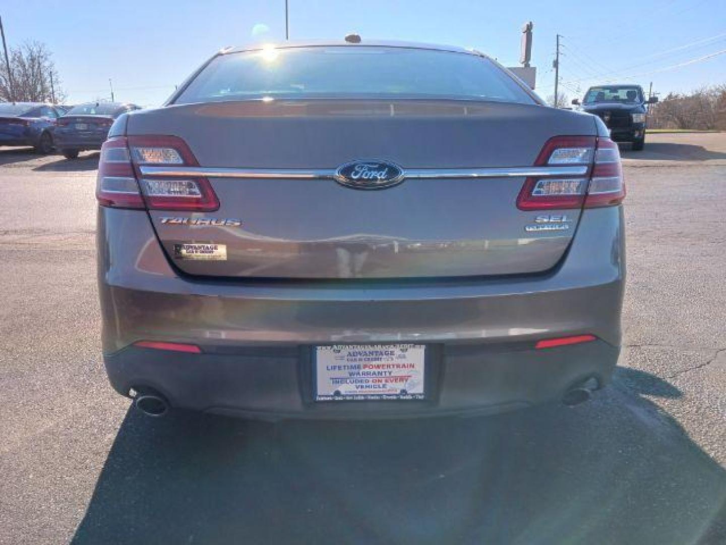 2013 Sterling Gray Metallic Ford Taurus SEL FWD (1FAHP2E81DG) with an 3.5L V6 DOHC 24V engine, 6-Speed Automatic transmission, located at 1951 S Dayton Lakeview Rd., New Carlisle, OH, 45344, (937) 908-9800, 39.890999, -84.050255 - Photo#5