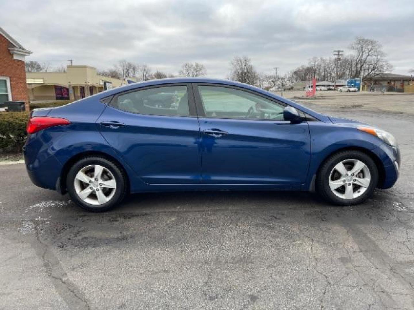 2013 Blue Sky Metallic Hyundai Elantra GLS A/T (KMHDH4AE7DU) with an 1.8L L4 DOHC 16V engine, 6-Speed Automatic transmission, located at 4508 South Dixie Dr, Moraine, OH, 45439, (937) 908-9800, 39.689976, -84.218452 - Photo#4