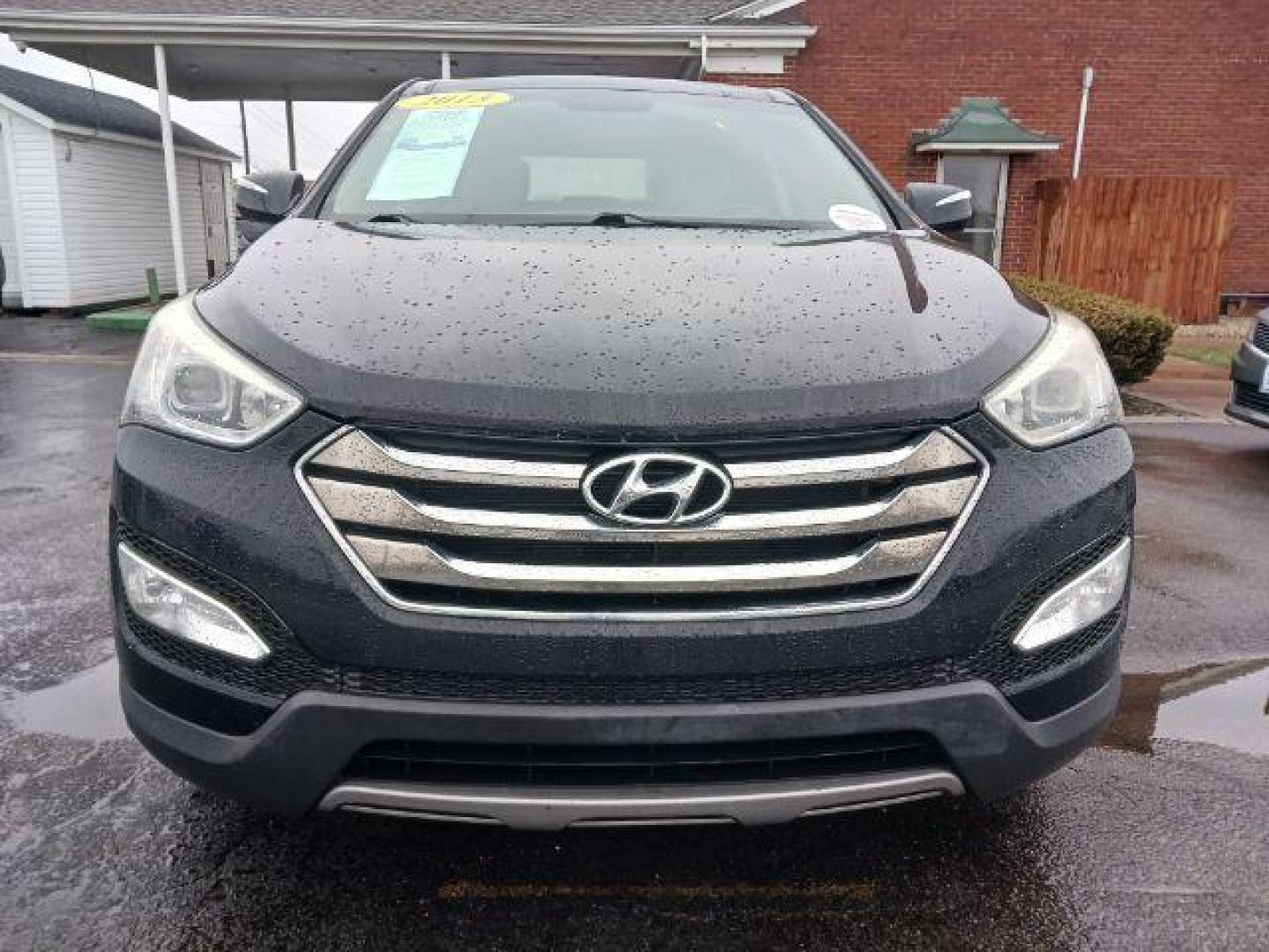 2013 Twilight Black Hyundai Santa Fe Sport 2.4 FWD (5XYZU3LB3DG) with an 2.4L L4 DOHC 16V engine, 6-Speed Automatic transmission, located at 401 Woodman Dr, Riverside, OH, 45431, (937) 908-9800, 39.760899, -84.123421 - Photo#1