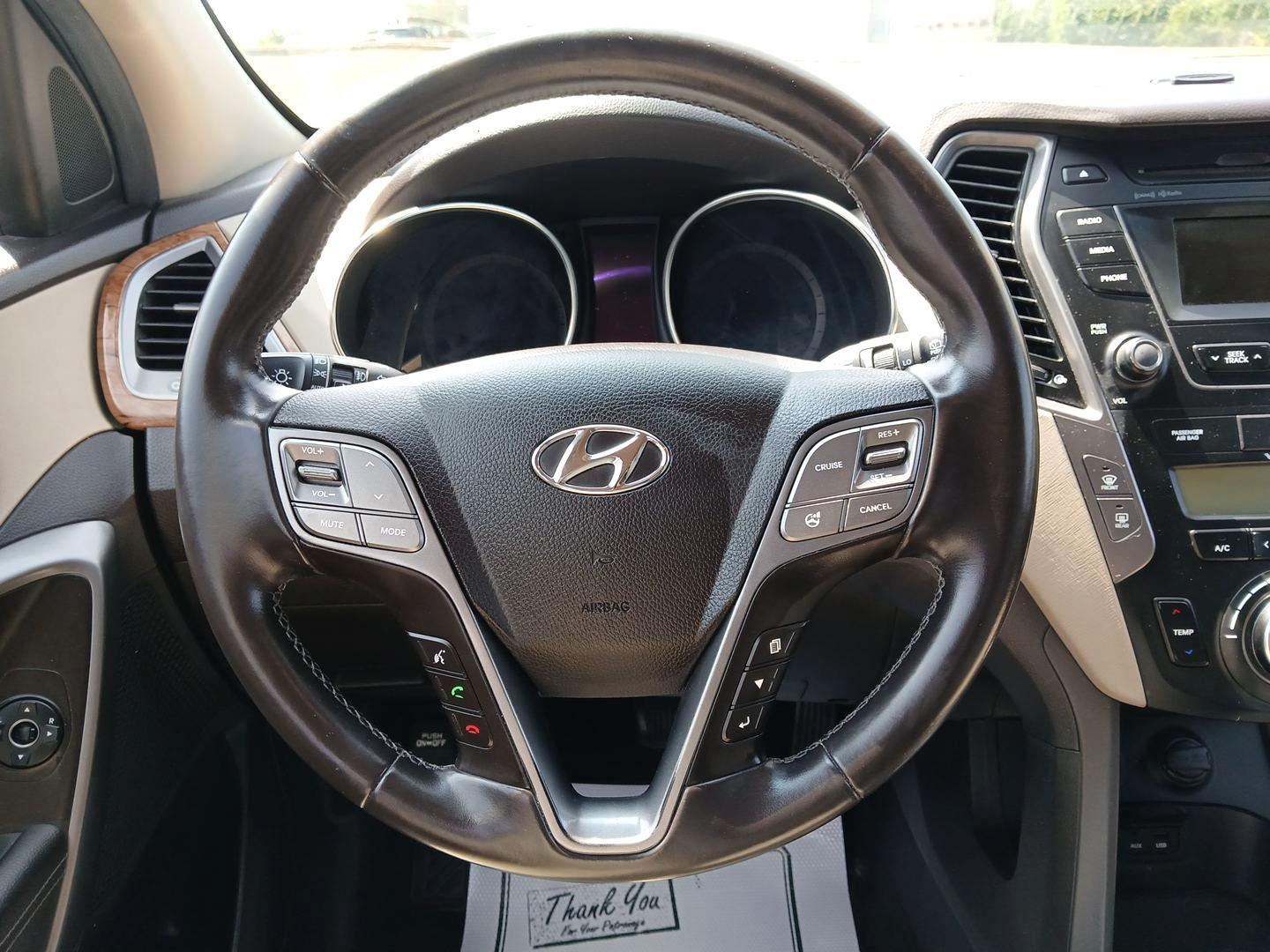 2013 Cabo Bronze Hyundai Santa Fe Sport 2.0 AWD (5XYZUDLA2DG) with an 2.0L L4 DOHC 16V engine, 6-Speed Automatic transmission, located at 401 Woodman Dr, Riverside, OH, 45431, (937) 908-9800, 39.760899, -84.123421 - Photo#15