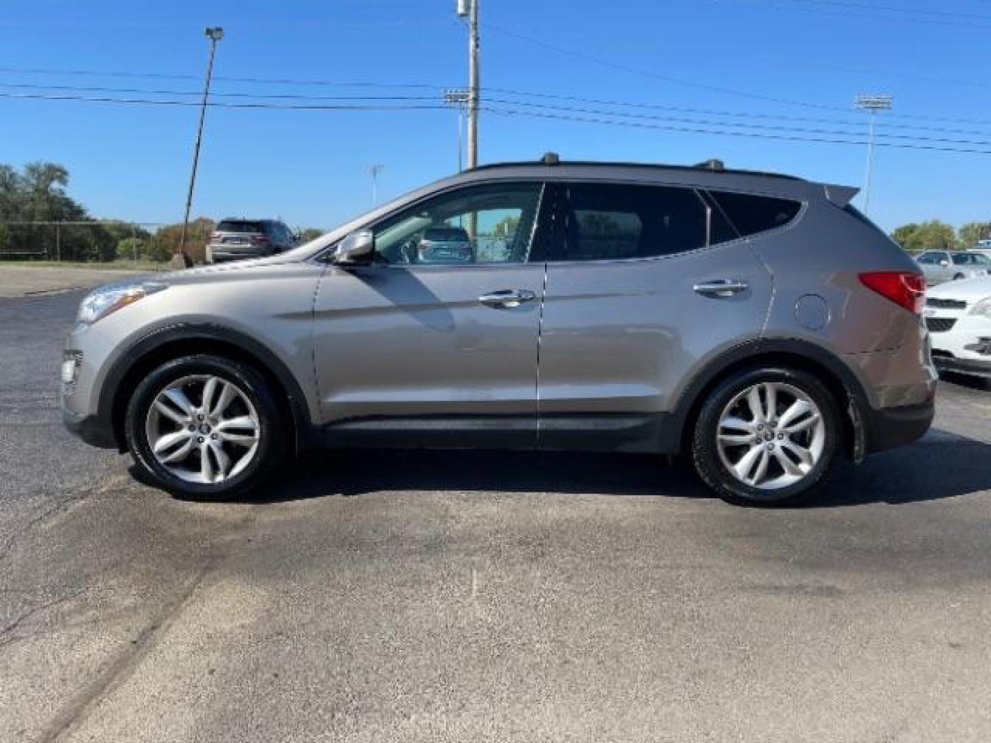 2013 Mineral Gray Hyundai Santa Fe Sport 2.0 FWD (5XYZU3LA8DG) with an 2.0L L4 DOHC 16V engine, 6-Speed Automatic transmission, located at 1184 Kauffman Ave, Fairborn, OH, 45324, (937) 908-9800, 39.807072, -84.030914 - Photo#5