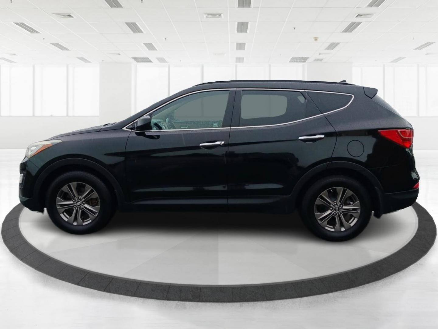 2013 Twilight Black Hyundai Santa Fe (5XYZUDLB5DG) with an 2.4L L4 DOHC 16V engine, 6-Speed Automatic transmission, located at 1951 S Dayton Lakeview Rd., New Carlisle, OH, 45344, (937) 908-9800, 39.890999, -84.050255 - Photo#5