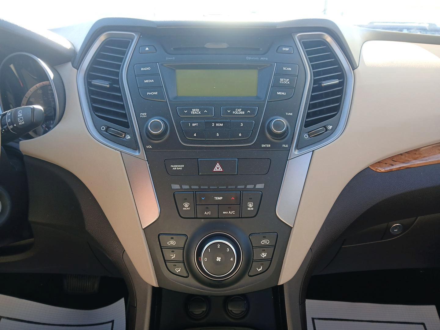 2013 Canyon Copper Hyundai Santa Fe Sport 2.4 AWD (5XYZUDLB7DG) with an 2.4L L4 DOHC 16V engine, 6-Speed Automatic transmission, located at 8750 N County Rd 25A, Piqua, OH, 45356, (937) 908-9800, 40.164391, -84.232513 - Photo#12