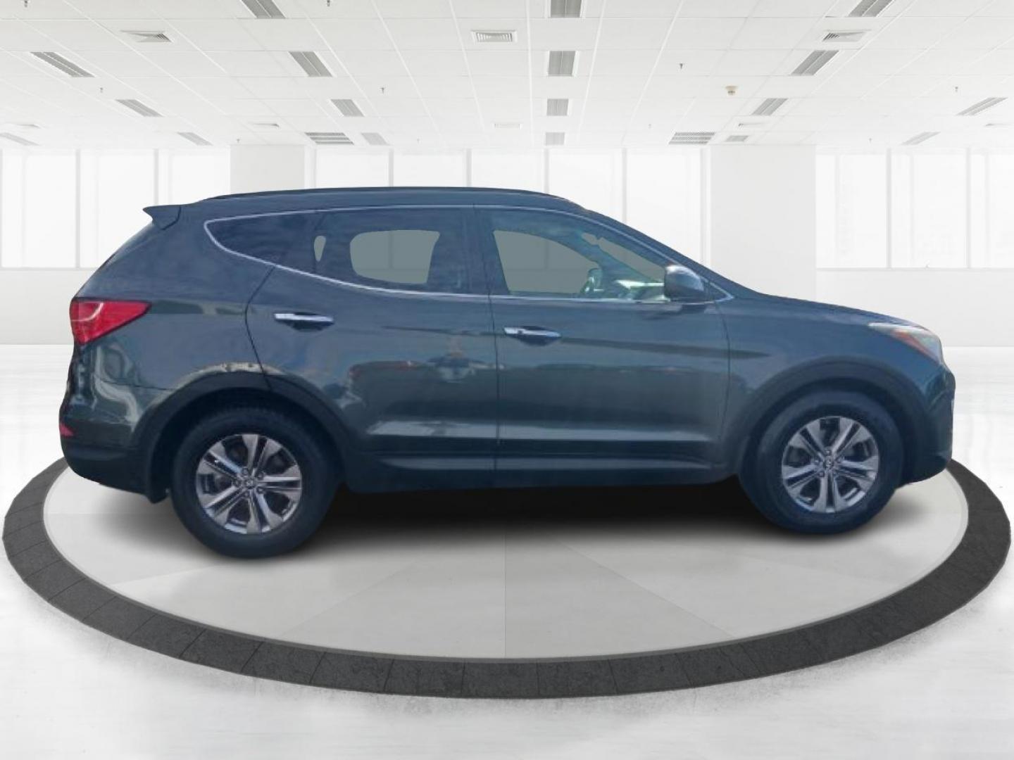 2013 Juniper Green Hyundai Santa Fe Sport 2.4 FWD (5XYZU3LB8DG) with an 2.4L L4 DOHC 16V engine, 6-Speed Automatic transmission, located at 1951 S Dayton Lakeview Rd., New Carlisle, OH, 45344, (937) 908-9800, 39.890999, -84.050255 - Photo#3