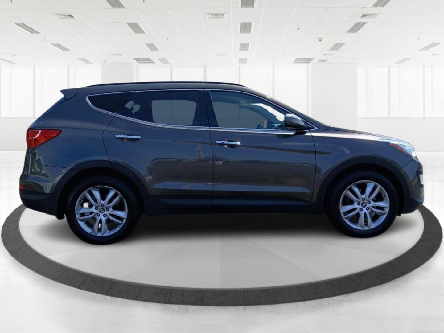 2013 Hyundai Santa Fe Sport 2.0 AWD (5XYZUDLA2DG) with an 2.0L L4 DOHC 16V engine, 6-Speed Automatic transmission, located at 401 Woodman Dr, Riverside, OH, 45431, (937) 908-9800, 39.760899, -84.123421 - 2013 Hyundai Santa Fe Sport 2.0 AWD - Photo#1