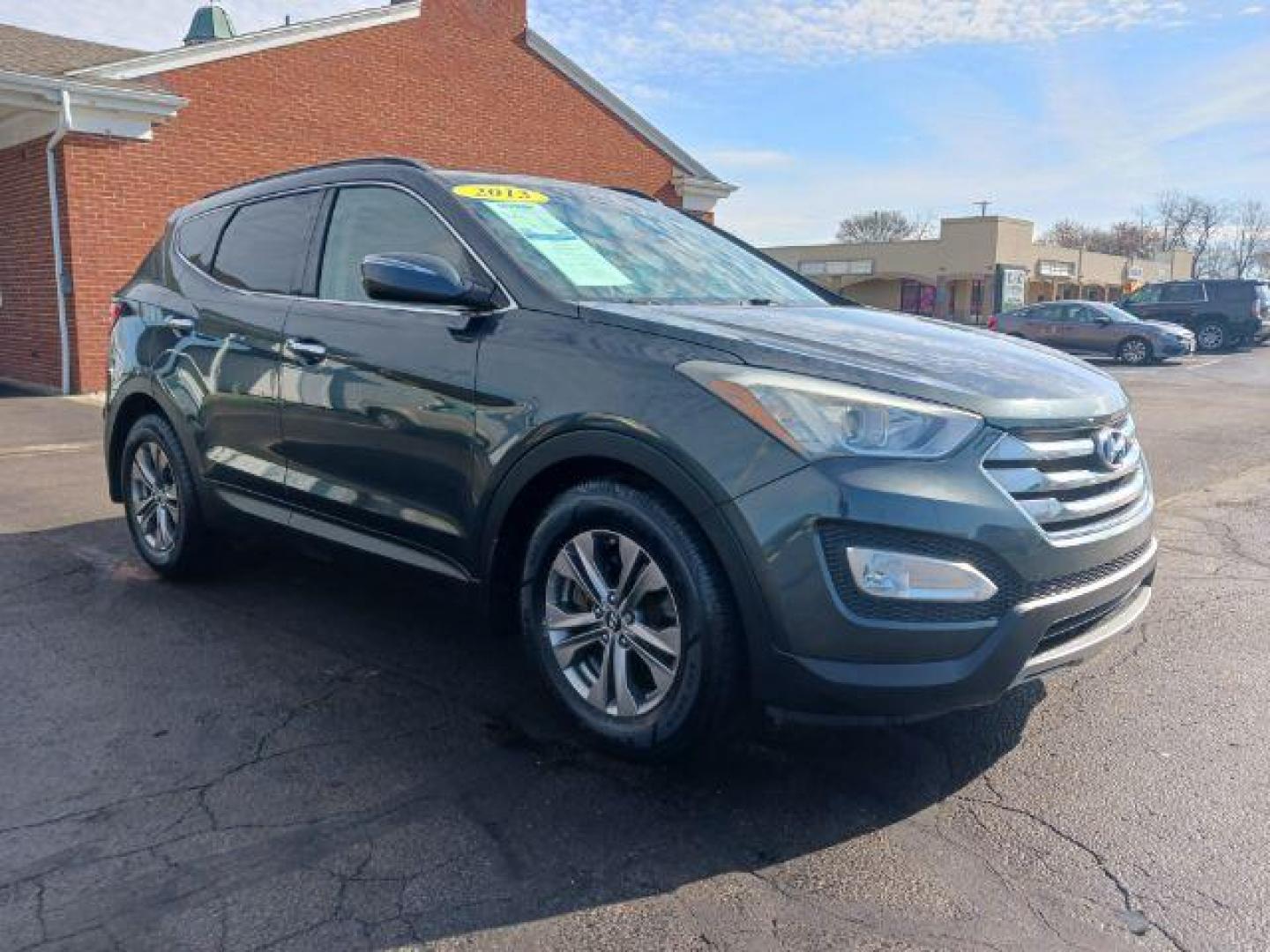 2013 Juniper Green Hyundai Santa Fe Sport 2.4 FWD (5XYZU3LB8DG) with an 2.4L L4 DOHC 16V engine, 6-Speed Automatic transmission, located at 1951 S Dayton Lakeview Rd., New Carlisle, OH, 45344, (937) 908-9800, 39.890999, -84.050255 - Photo#0