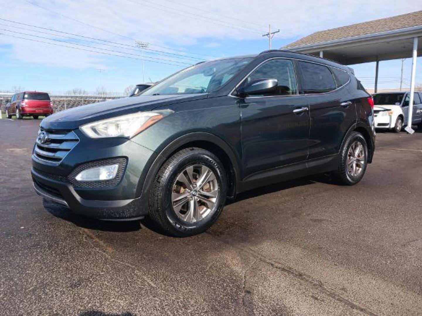 2013 Juniper Green Hyundai Santa Fe Sport 2.4 FWD (5XYZU3LB8DG) with an 2.4L L4 DOHC 16V engine, 6-Speed Automatic transmission, located at 1951 S Dayton Lakeview Rd., New Carlisle, OH, 45344, (937) 908-9800, 39.890999, -84.050255 - Photo#4