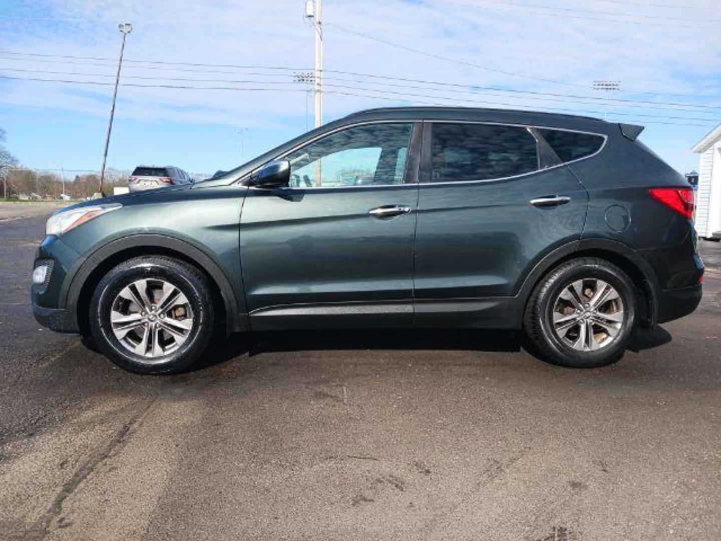 2013 Juniper Green Hyundai Santa Fe Sport 2.4 FWD (5XYZU3LB8DG) with an 2.4L L4 DOHC 16V engine, 6-Speed Automatic transmission, located at 1951 S Dayton Lakeview Rd., New Carlisle, OH, 45344, (937) 908-9800, 39.890999, -84.050255 - Photo#6