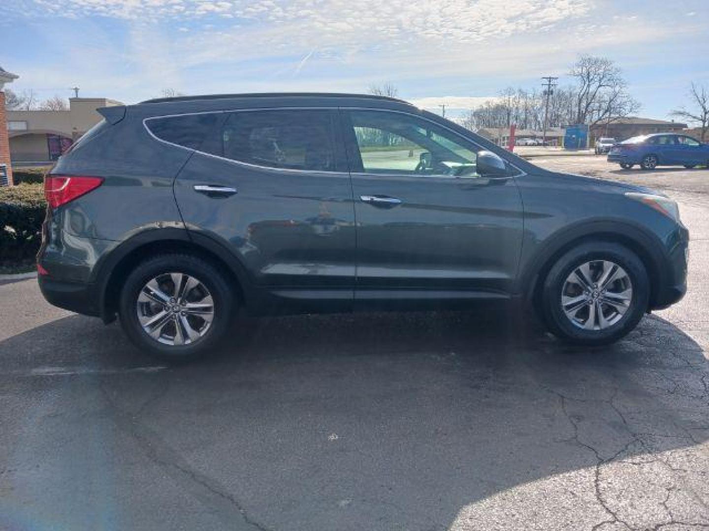 2013 Juniper Green Hyundai Santa Fe Sport 2.4 FWD (5XYZU3LB8DG) with an 2.4L L4 DOHC 16V engine, 6-Speed Automatic transmission, located at 1951 S Dayton Lakeview Rd., New Carlisle, OH, 45344, (937) 908-9800, 39.890999, -84.050255 - Photo#8