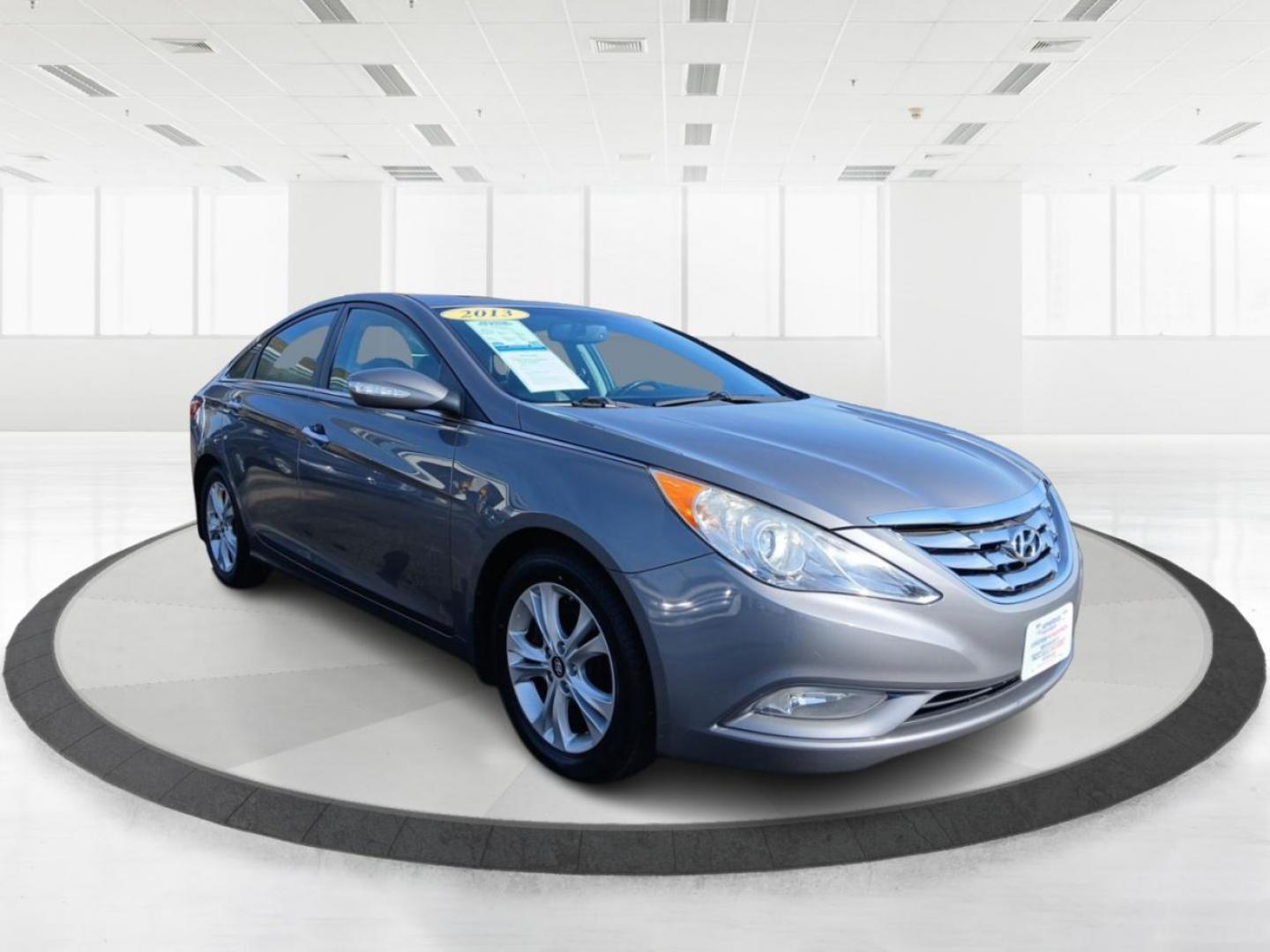 2013 Gray Hyundai Sonata Limited Auto (5NPEC4AC7DH) with an 2.4L L4 DOHC 16V engine, 6-Speed Automatic transmission, located at 401 Woodman Dr, Riverside, OH, 45431, (937) 908-9800, 39.760899, -84.123421 - Photo#0