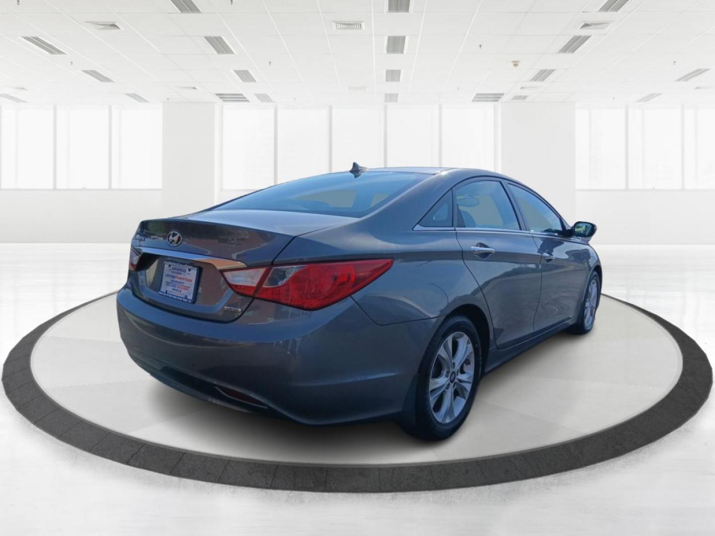 2013 Gray Hyundai Sonata Limited Auto (5NPEC4AC7DH) with an 2.4L L4 DOHC 16V engine, 6-Speed Automatic transmission, located at 401 Woodman Dr, Riverside, OH, 45431, (937) 908-9800, 39.760899, -84.123421 - Photo#2