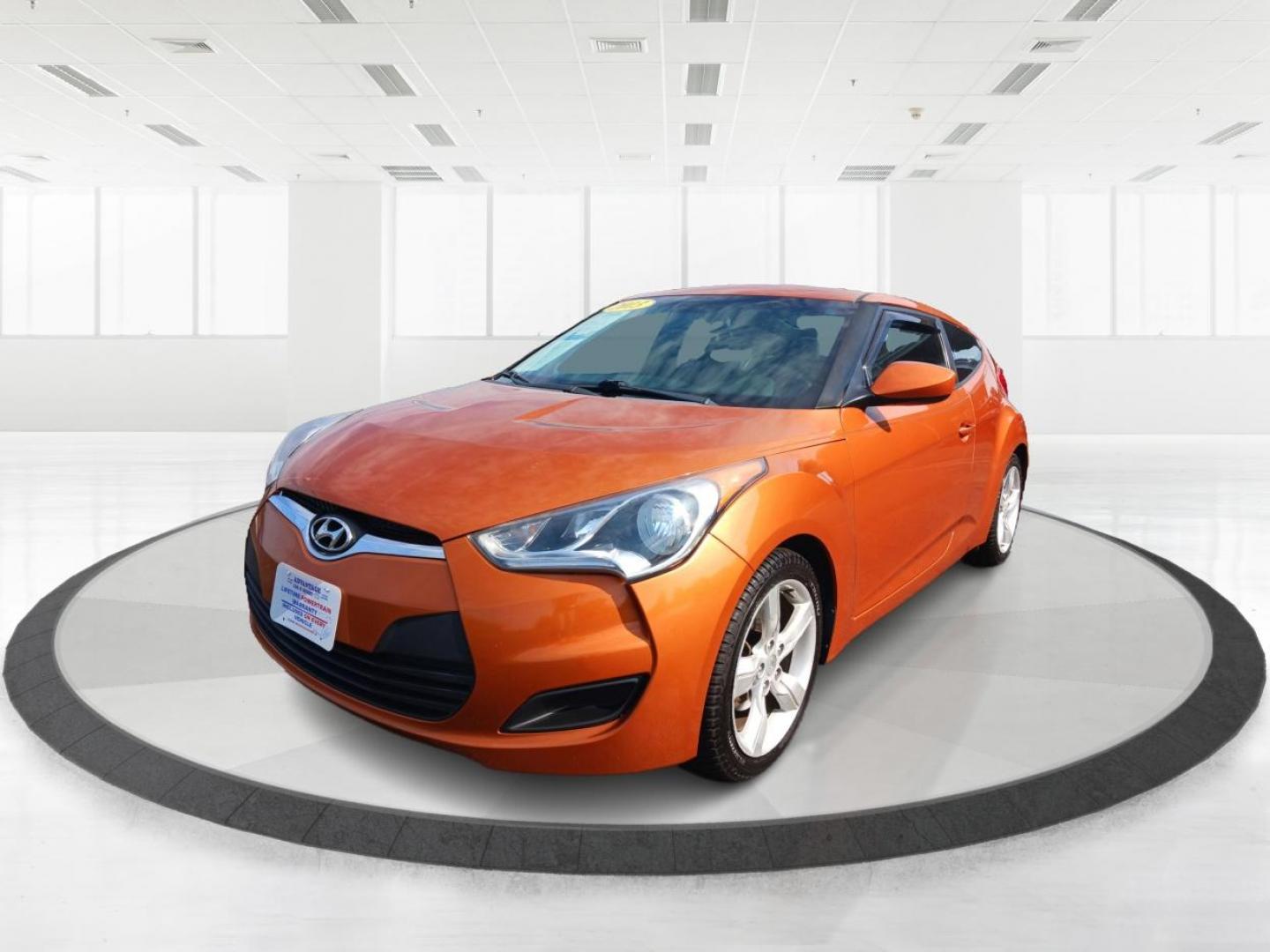 2013 Vitamin C Hyundai Veloster (KMHTC6AD8DU) with an 1.6L L4 DOHC 16V engine, located at 401 Woodman Dr, Riverside, OH, 45431, (937) 908-9800, 39.760899, -84.123421 - Photo#7