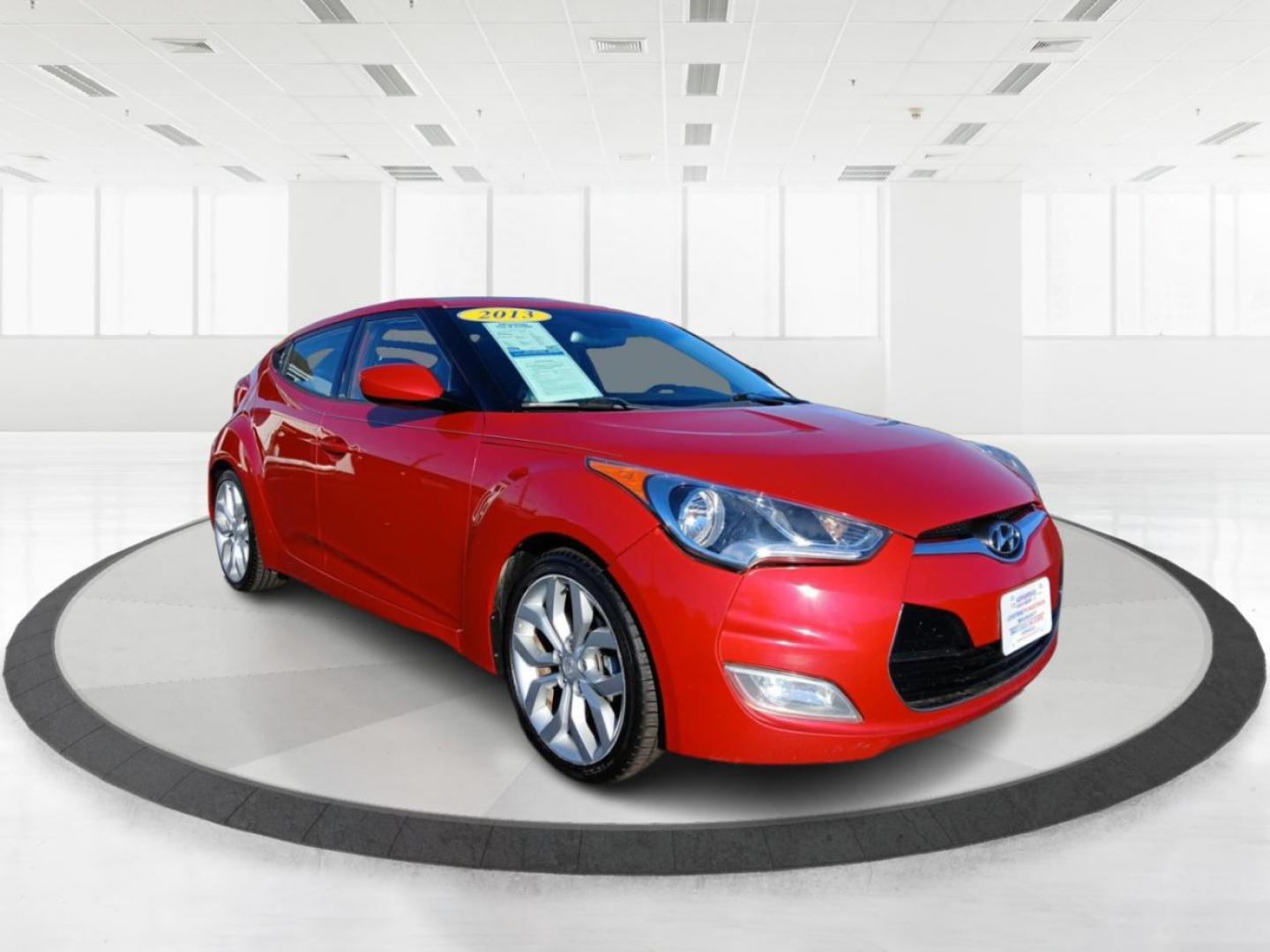 2013 Boston Red Metallic Hyundai Veloster Base (KMHTC6ADXDU) with an 1.6L L4 DOHC 16V engine, located at 401 Woodman Dr, Riverside, OH, 45431, (937) 908-9800, 39.760899, -84.123421 - Photo#0